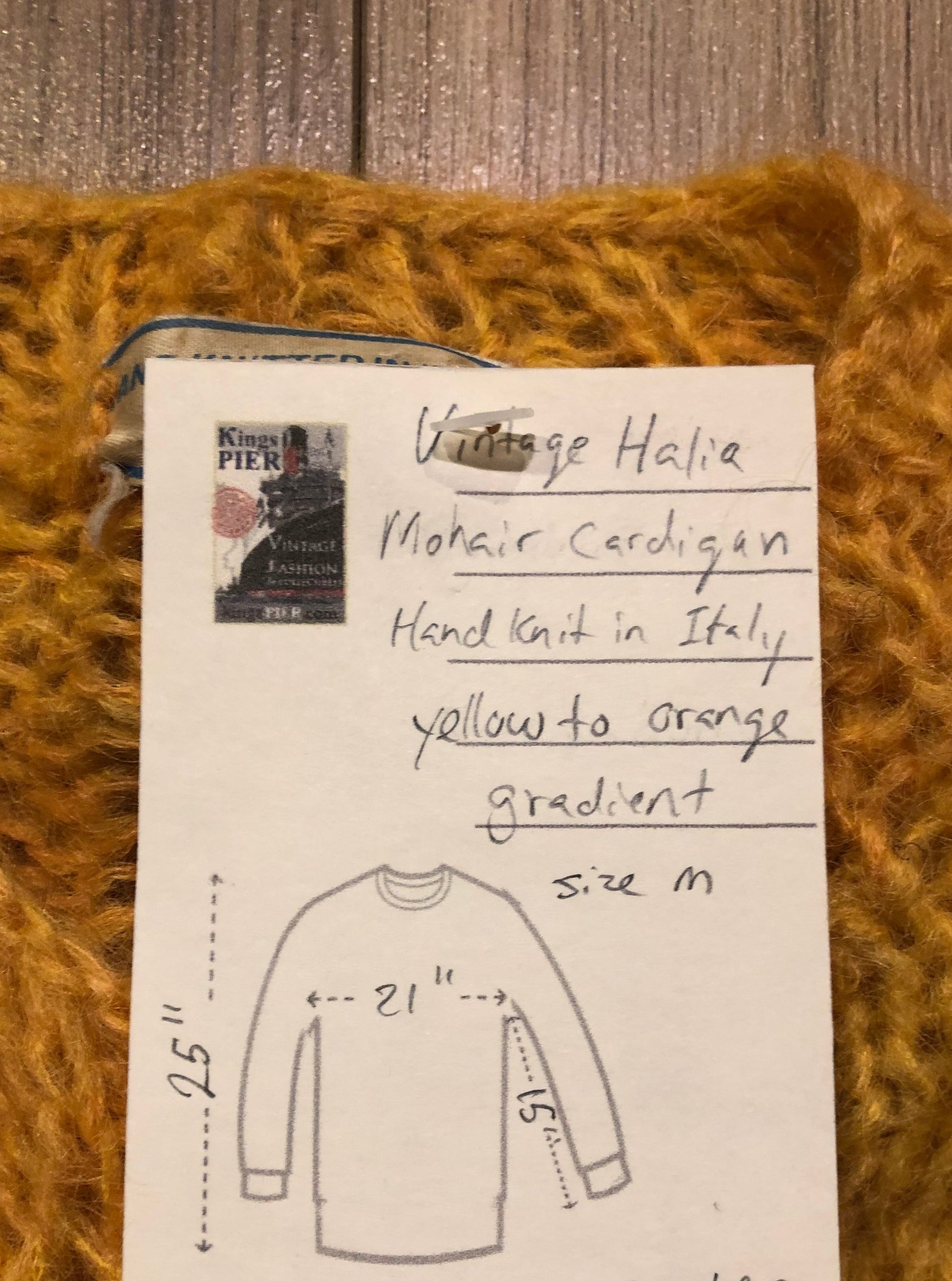 Kingspier Vintage - Vintage Halia mohair cardigan with button closures and yellow to orange gradient design.
Handknit in Italy.
Size medium.