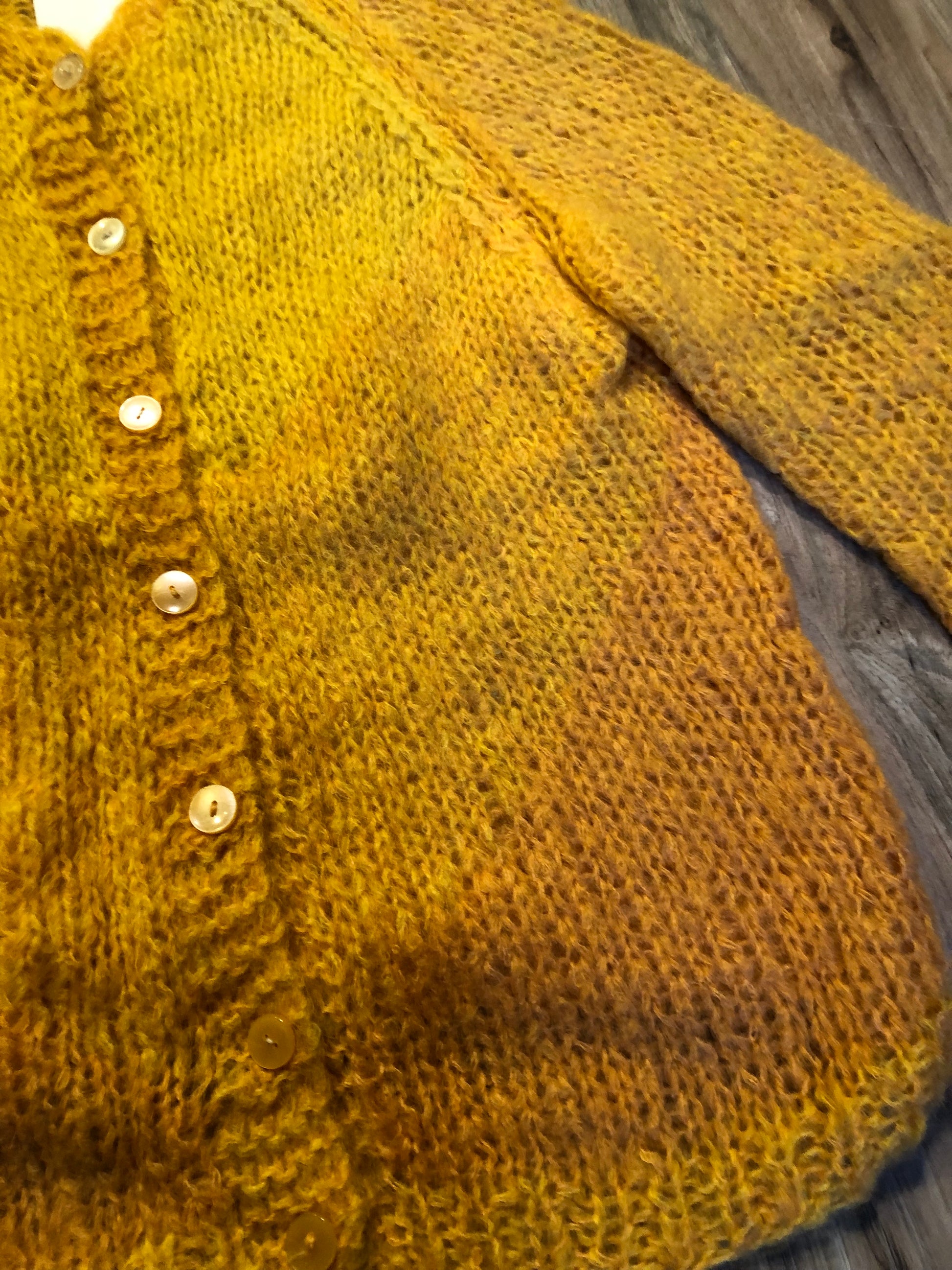 Kingspier Vintage - Vintage Halia mohair cardigan with button closures and yellow to orange gradient design.
Handknit in Italy.
Size medium.