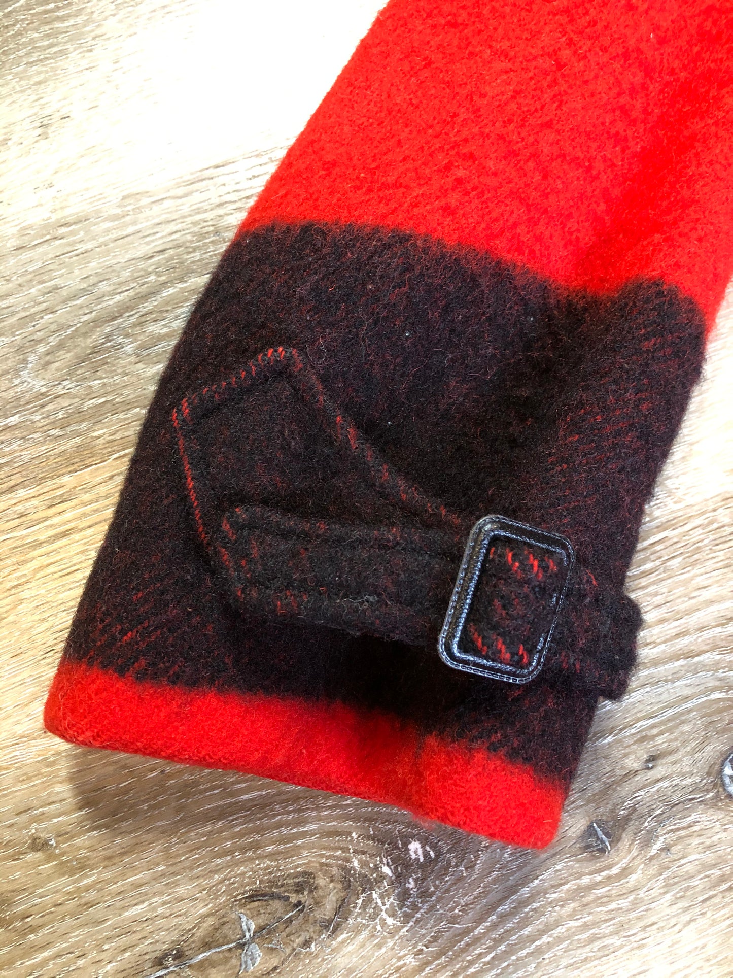 Kingspier Vintage - Hudson’s Bay Company red and black stripe 100% virgin wool point blanket coat in a swing coat style with belt, buckle detail at the collar, button closures, slash pockets and red lining. Size medium/ large.