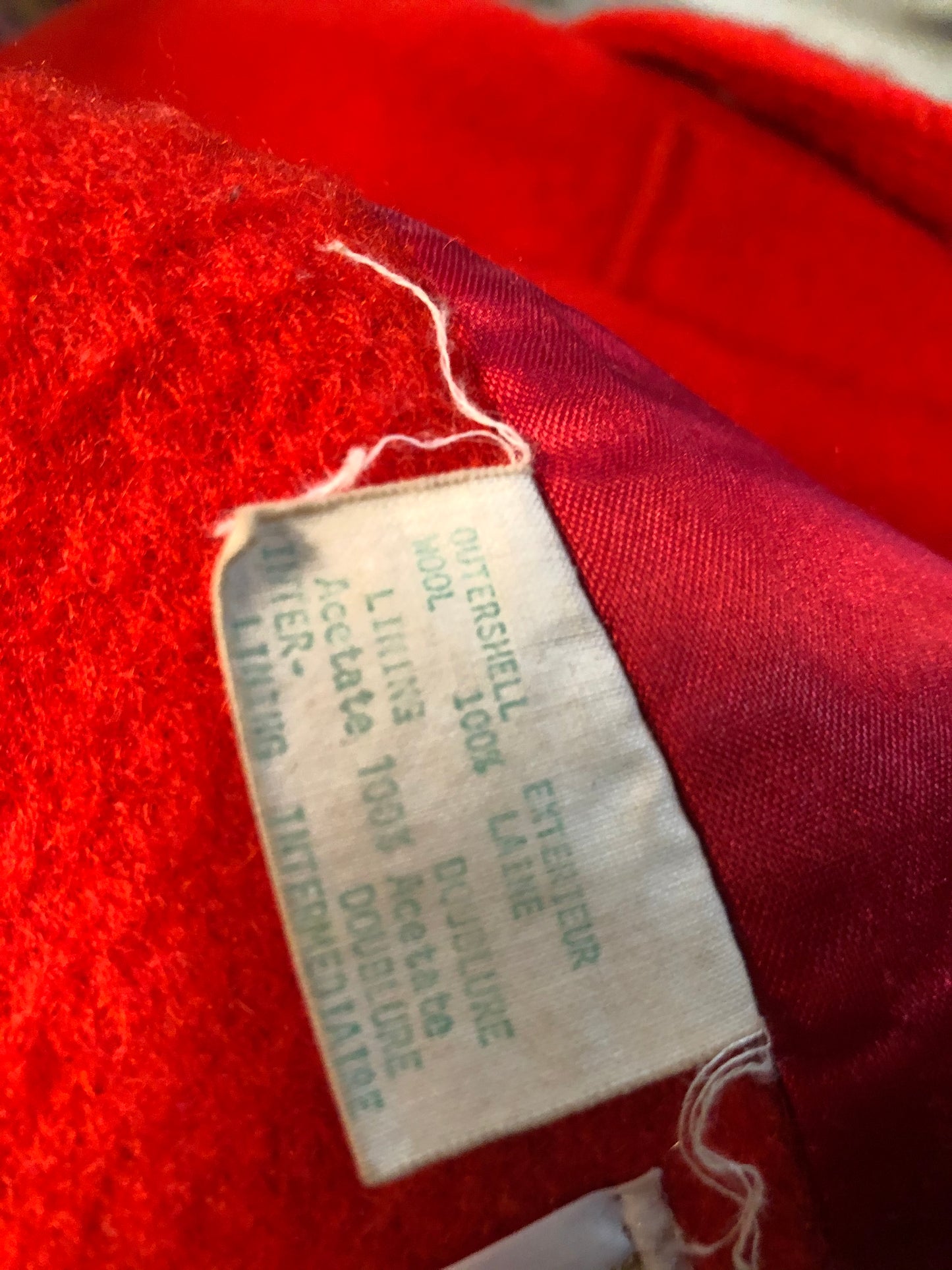 Kingspier Vintage - Hudson’s Bay Company red and black stripe 100% virgin wool point blanket coat in a swing coat style with belt, buckle detail at the collar, button closures, slash pockets and red lining. Size medium/ large.