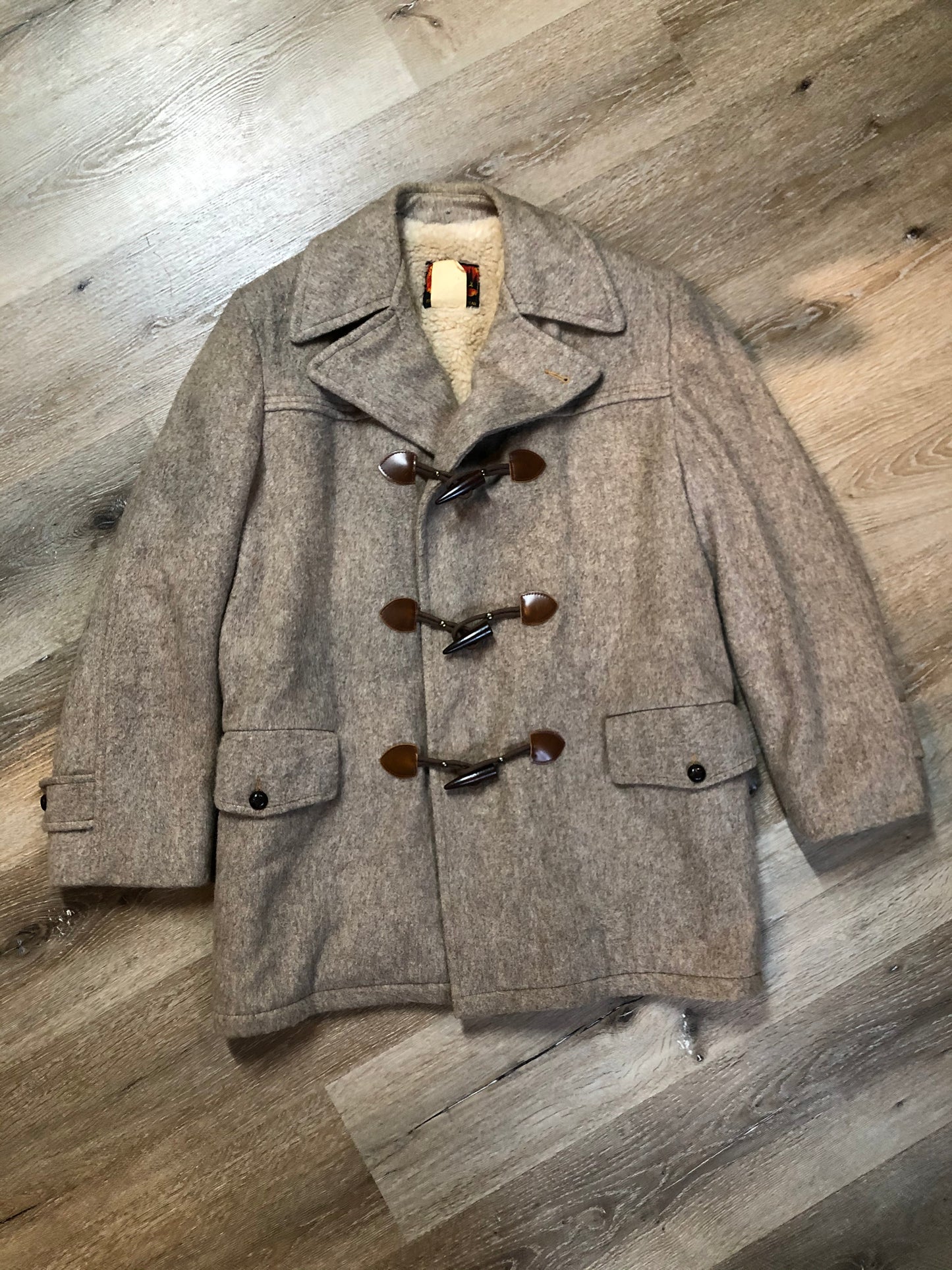 Kingspier Vintage - Wild Woods grey wool duffle coat with wooden toggles and zip closures, patch pockets, Sherpa and quilted lining. Made in Canada.