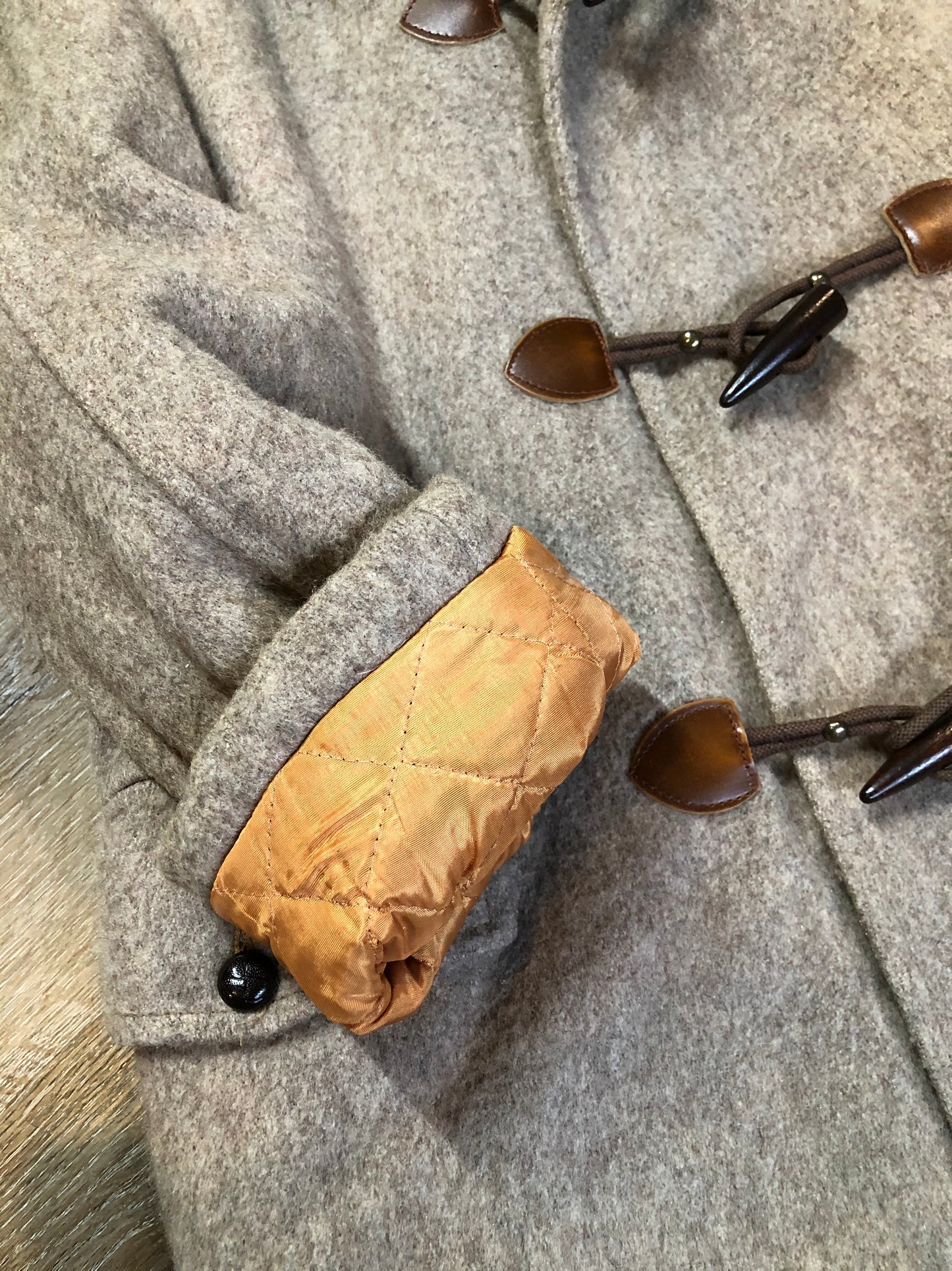 Kingspier Vintage - Wild Woods grey wool duffle coat with wooden toggles and zip closures, patch pockets, Sherpa and quilted lining. Made in Canada.
