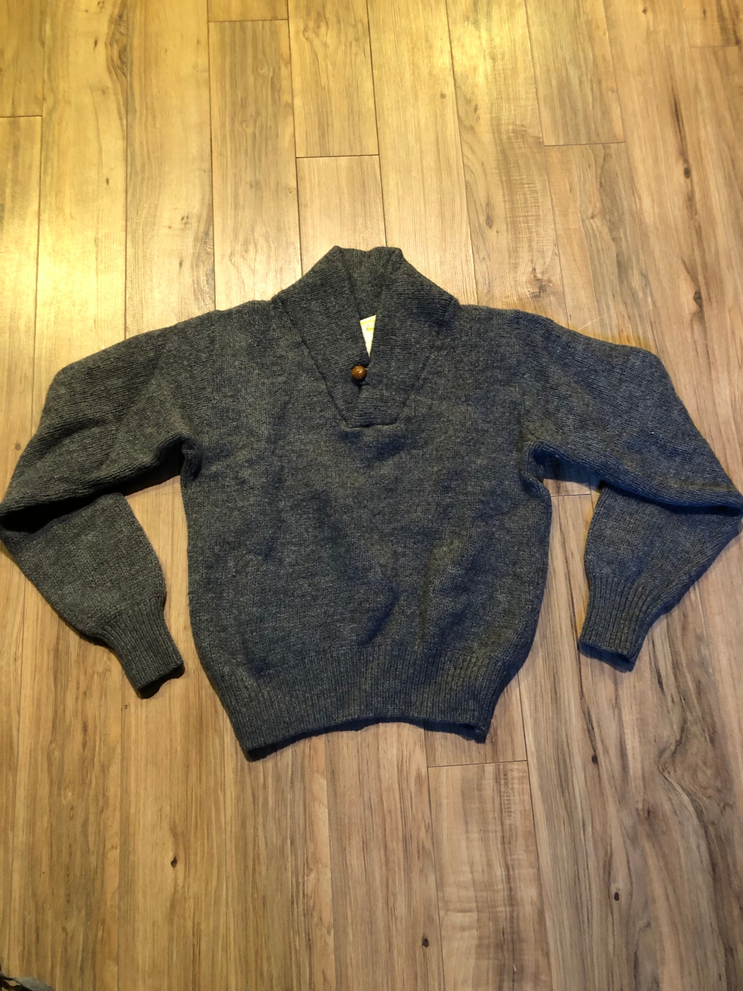 Kingspier Vintage - Vintage Cambridge Dry Goods 100% grey wool pullover sweater with one button.
Wool is worsted in Maine and loomed in USA.
Size small.