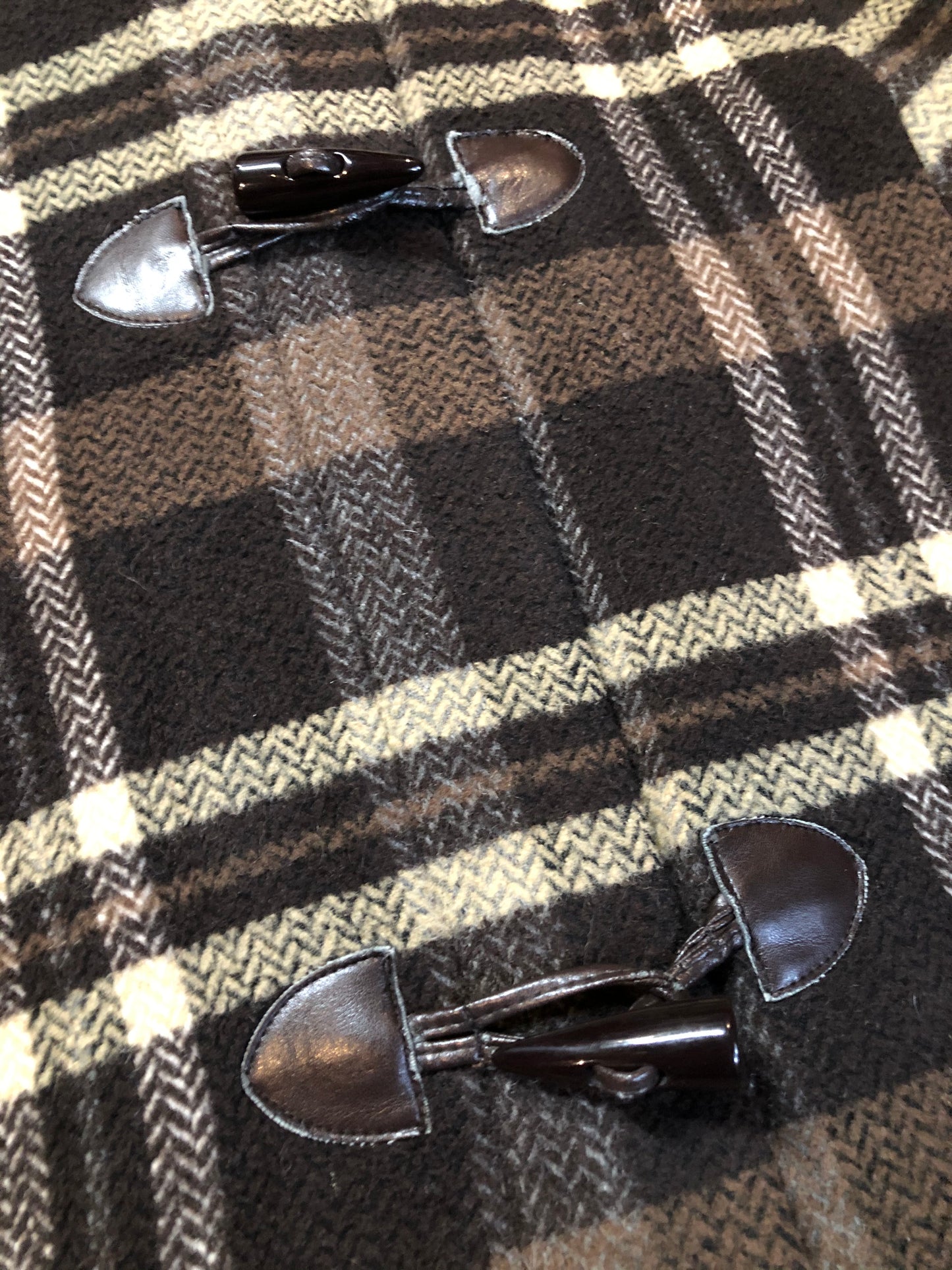 Kingspier Vintage - Sachi brown plaid wool blend duffle coat with dark brown Finnish fox fur trimmed hood, toggle and zip closures and vertical pockets. Size small/ medium.