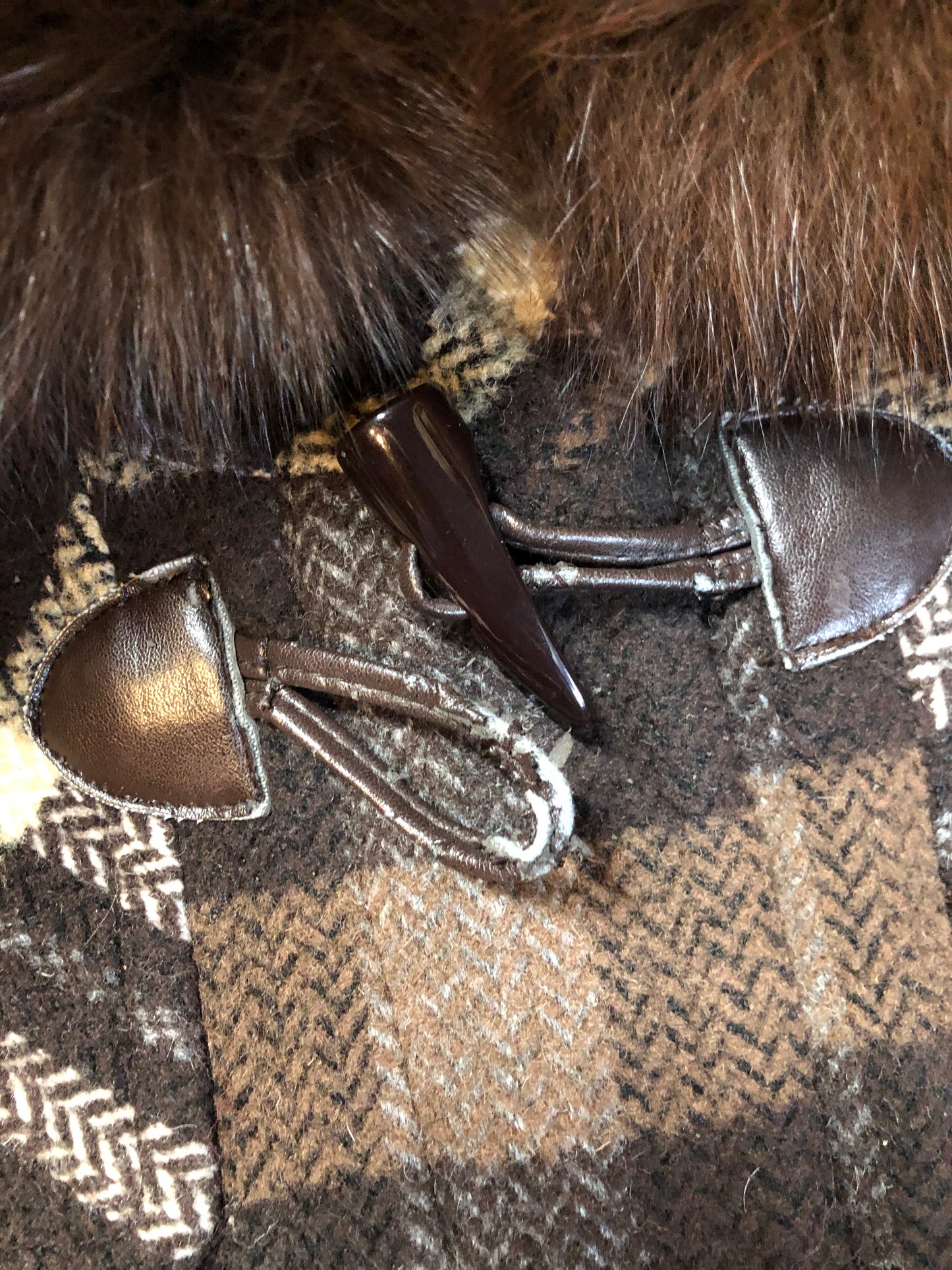 Kingspier Vintage - Sachi brown plaid wool blend duffle coat with dark brown Finnish fox fur trimmed hood, toggle and zip closures and vertical pockets. Size small/ medium.