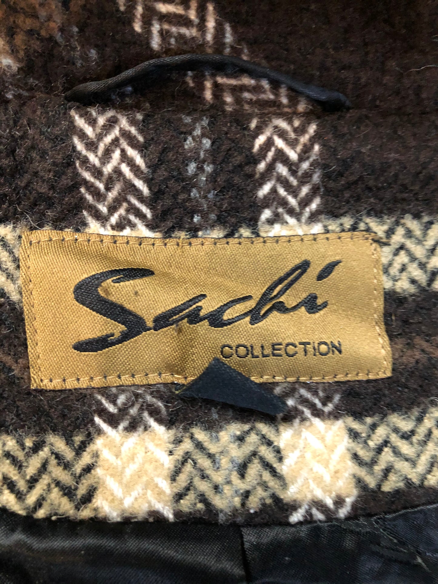 Kingspier Vintage - Sachi brown plaid wool blend duffle coat with dark brown Finnish fox fur trimmed hood, toggle and zip closures and vertical pockets. Size small/ medium.