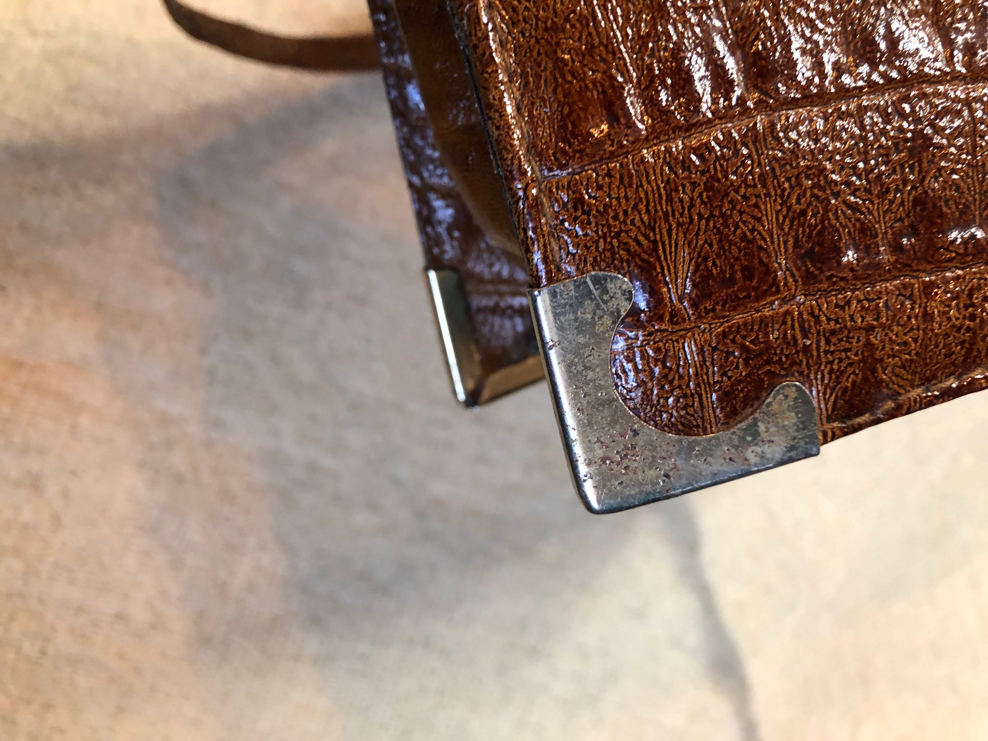 Kingspier Vintage - Vintage Veneto reptile skin satchel with front pocket, removable shoulder strap and two large inside compartments. Made in Italy.
Length - 14”
Width - 3.5”
Height - 9”
Strap - 33”
This purse is in excellent condition.