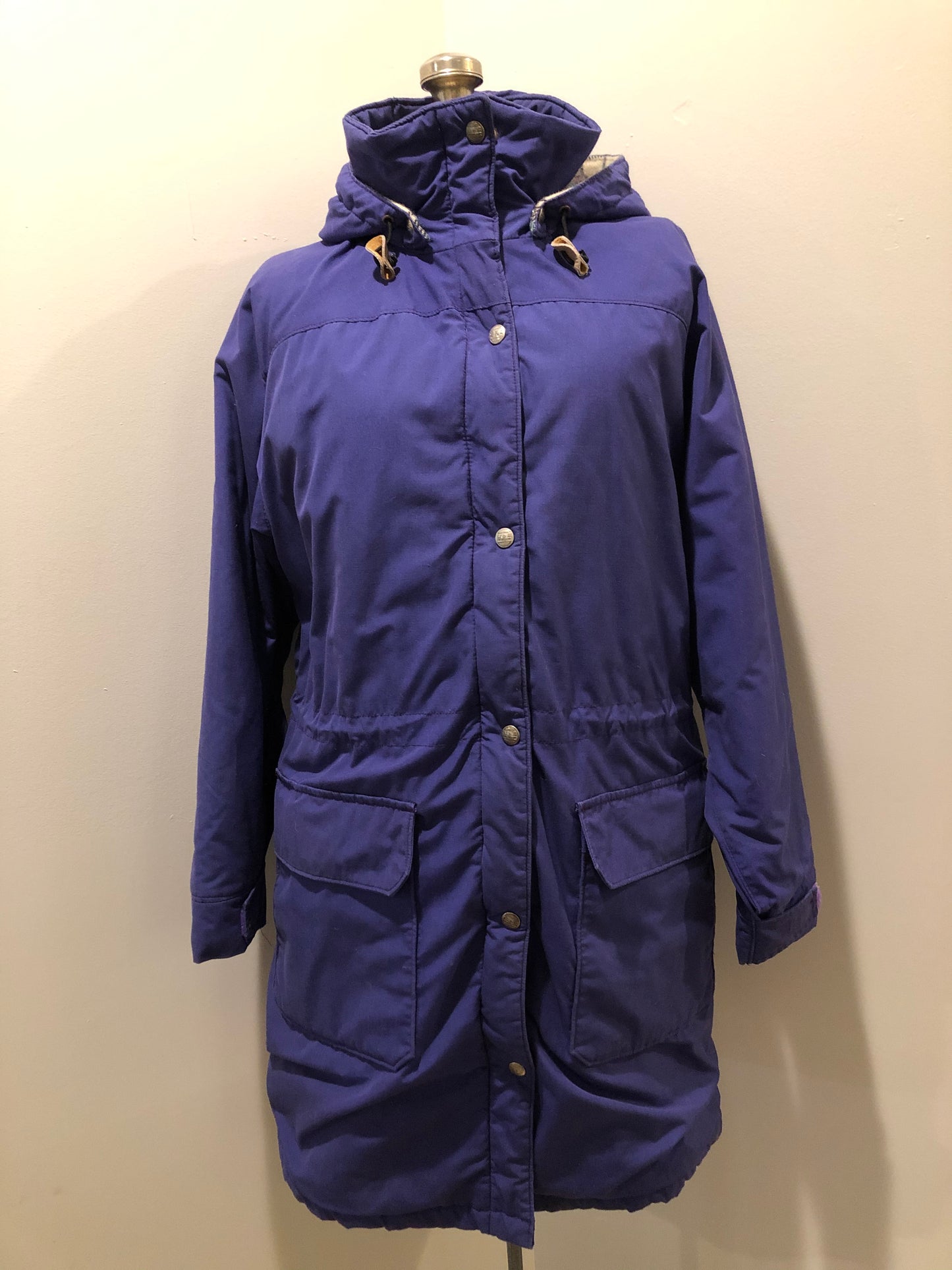 Kingspier Vintage - LL Bean purple casual coat with plaid lining, snap and zip closures, flap pockets, drawstring at the waist and detachable hood. Size medium.