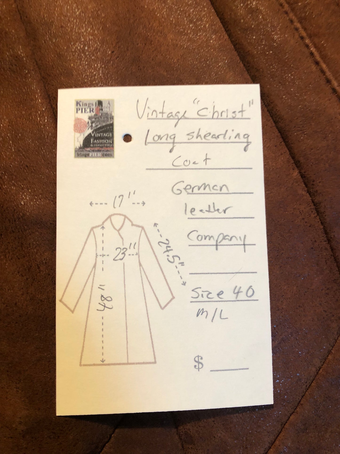 Kingspier Vintage - Vintage “Christ German Leather Fashion” full length buttery soft shearling coat with button closures, two front pockets and removable shoulder pads.
Size 40/ medium/ large