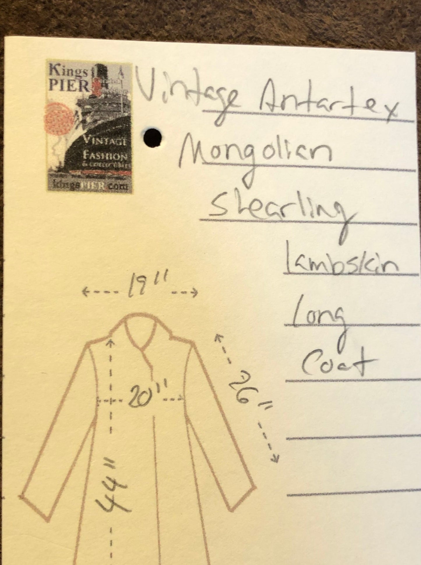 Vintage Antarrex Mongolian lambskin full length shearling coat with button closures and two front pockets.