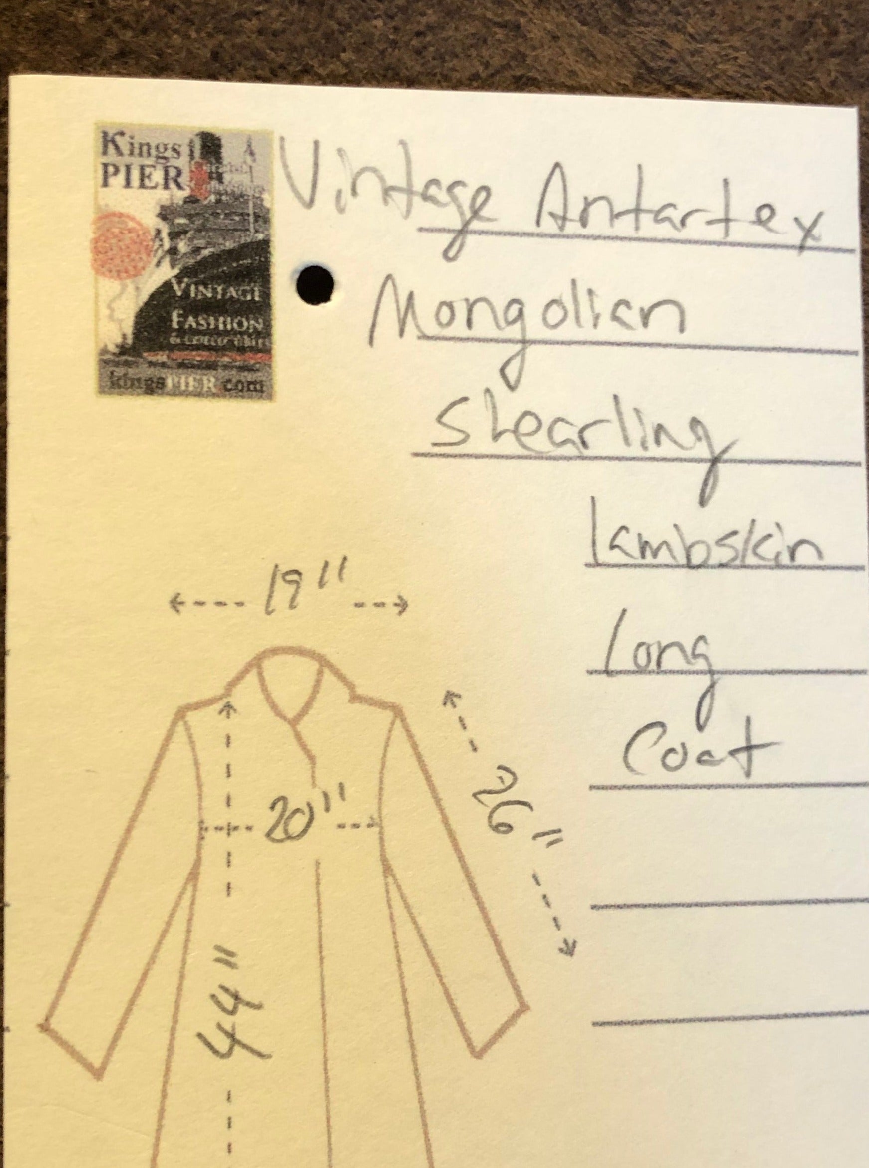 Vintage Antarrex Mongolian lambskin full length shearling coat with button closures and two front pockets.