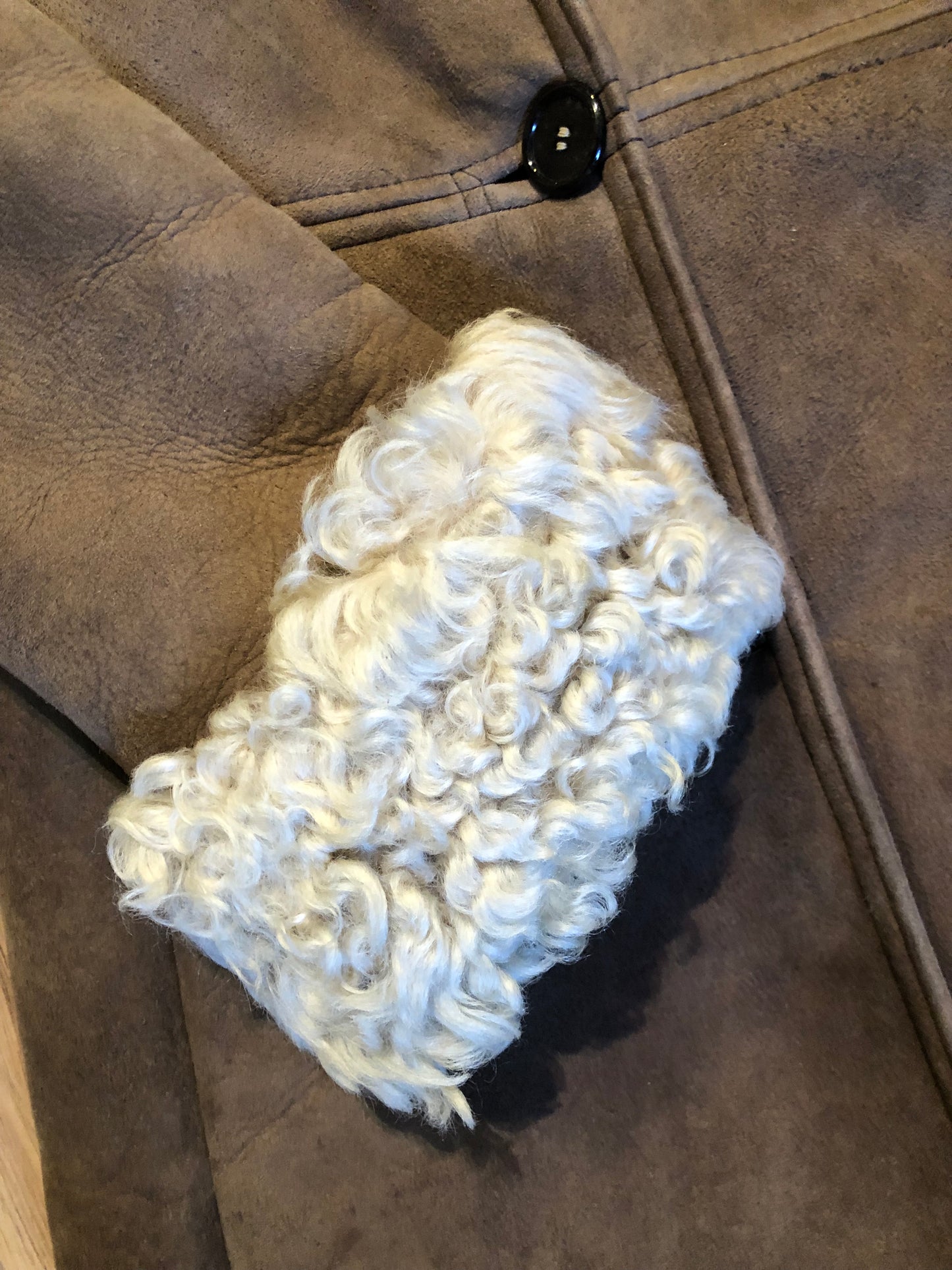 Vintage Antarrex Mongolian lambskin full length shearling coat with button closures and two front pockets.