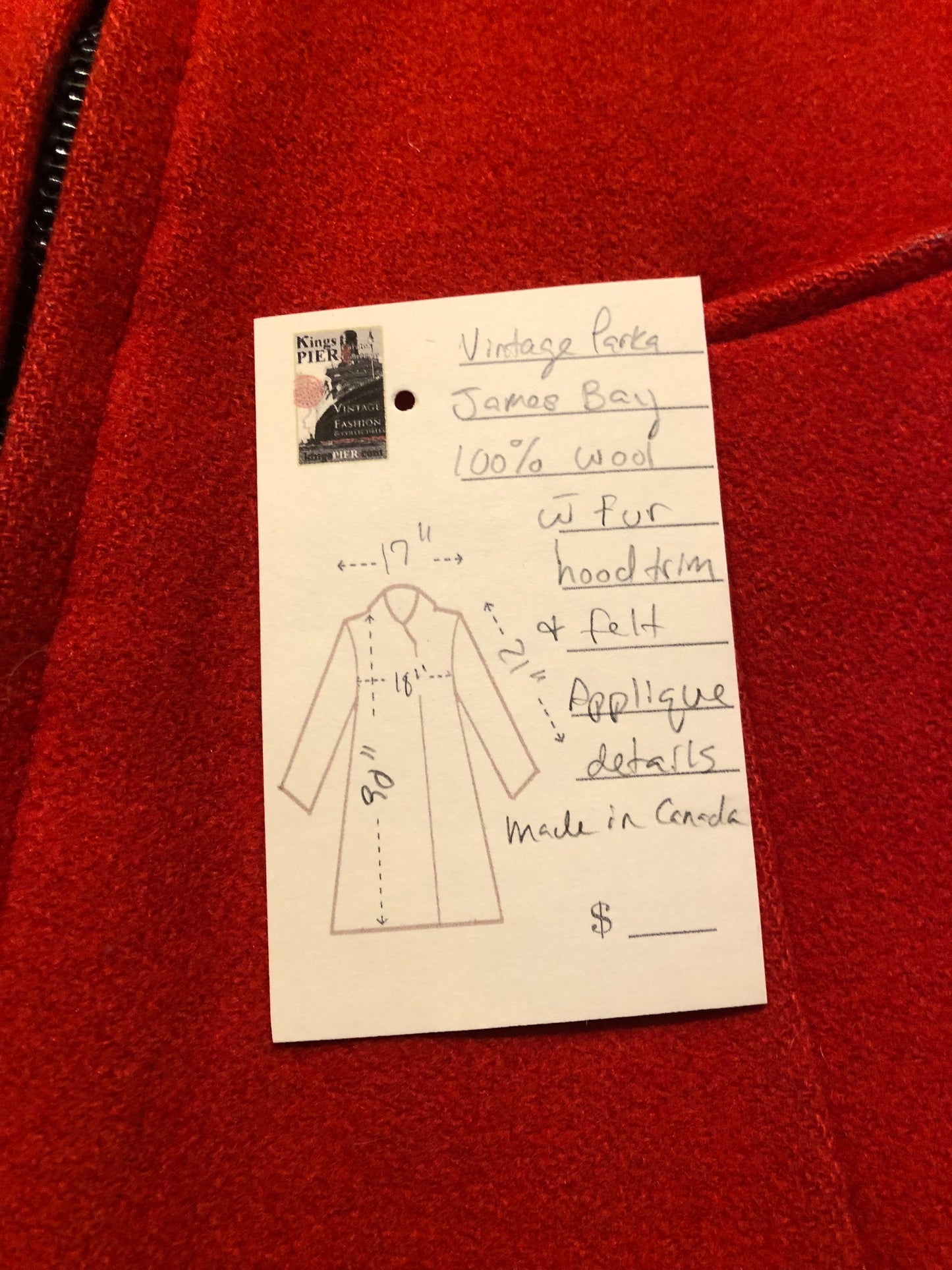 Kingspier Vintage - Vintage James Bay 100% virgin wool northern parka in bright red. This parka features a fur trimmed hood, zipper closure, pockets, quilted lining, storm cuffs, and penguin scene in felt applique. Made in Canada.