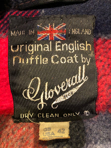 Kingspier Vintage - Vintage Gloverall wool blend duffle coat in navy with zipper and bone toggle closures, flap pockets and a red plaid lining.

Made in England.
Size 42.

Shoulder to shoulder - 20”
Shoulder to wrist - 26”
Armpit to armpit - 24”
Front length - 37”

*All items have been laid flat to measure.

This coat is in great vintage condition with some wear in the cuffs and hem.