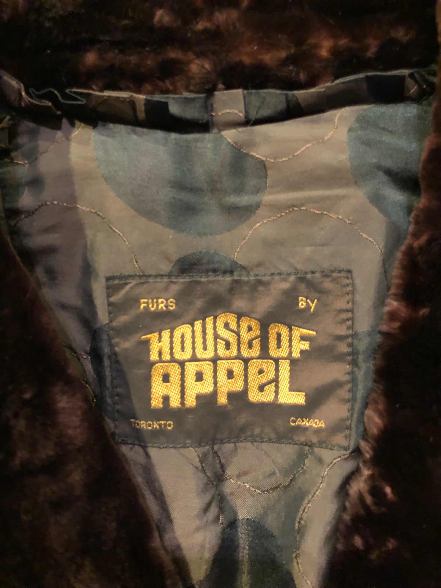 Kingspier Vintage - Vintage House of Appel long fur coat with flared sleeves, hook and eye closures, two front pockets and a “L.C.J.” monogram in the satin lining.