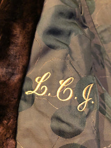 Kingspier Vintage - Vintage House of Apple long fur coat with flared sleeves, hook and eye closures, two front pockets and a “L.C.J.” monogram in the satin lining.