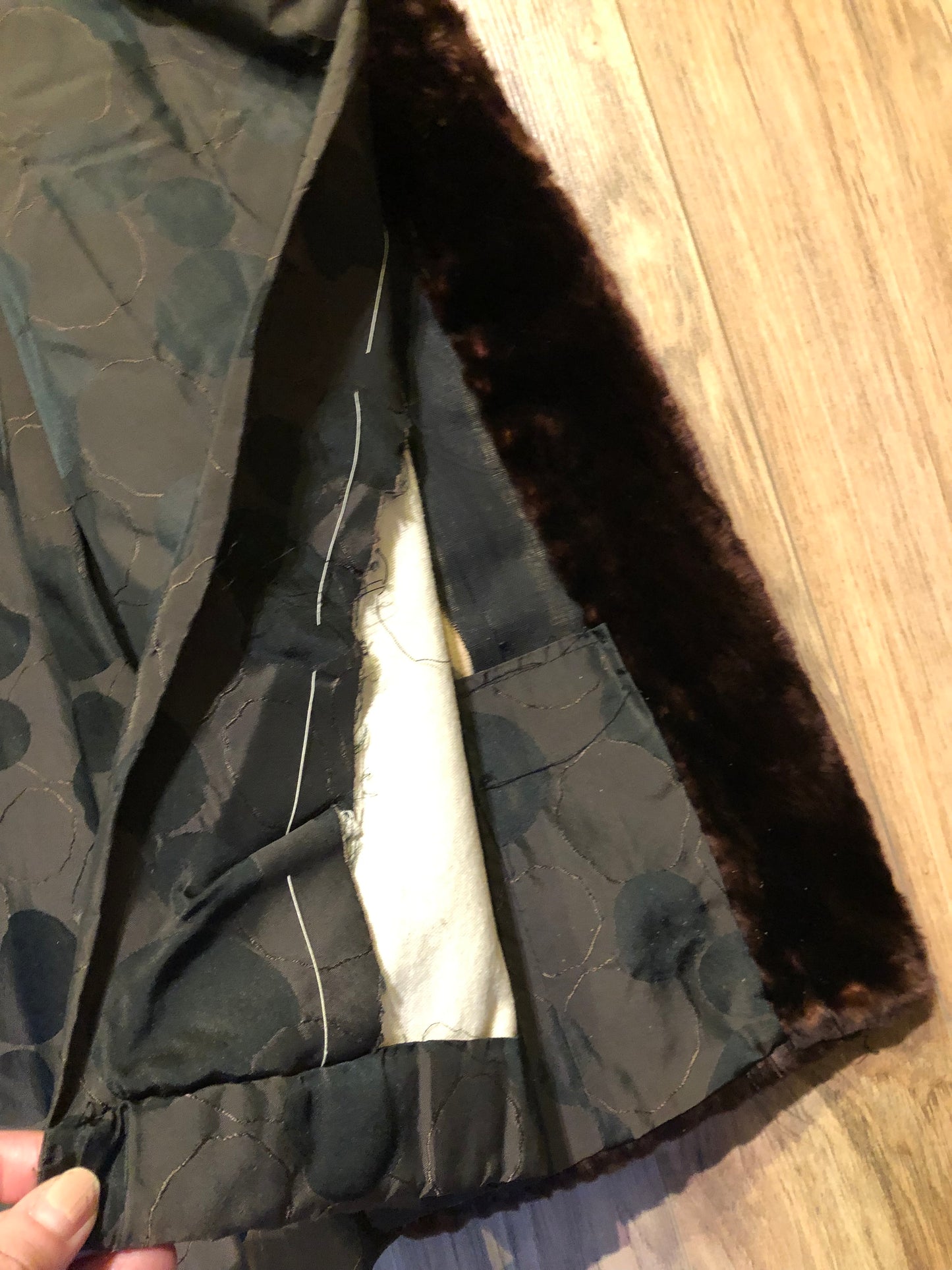 Kingspier Vintage - Vintage House of Apple long fur coat with flared sleeves, hook and eye closures, two front pockets and a “L.C.J.” monogram in the satin lining.