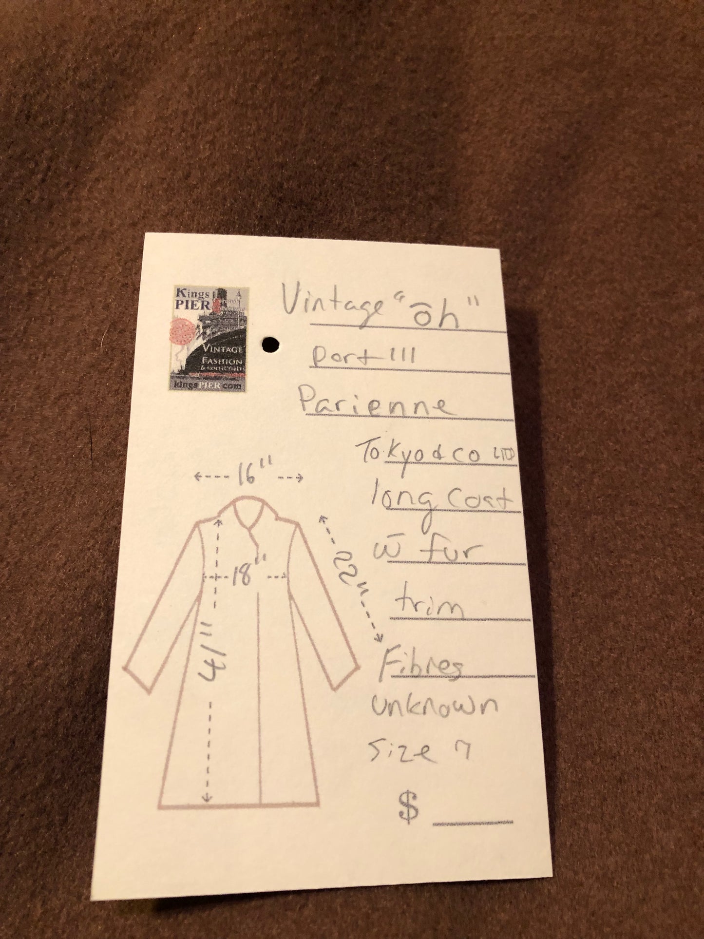 Kingspier Vintage - Vintage “Ch” Part three Parienne by Tokyo and Co long coat with fur trim cape, button closures and two front flap pockets.
Fibres unknown.
Size 7.