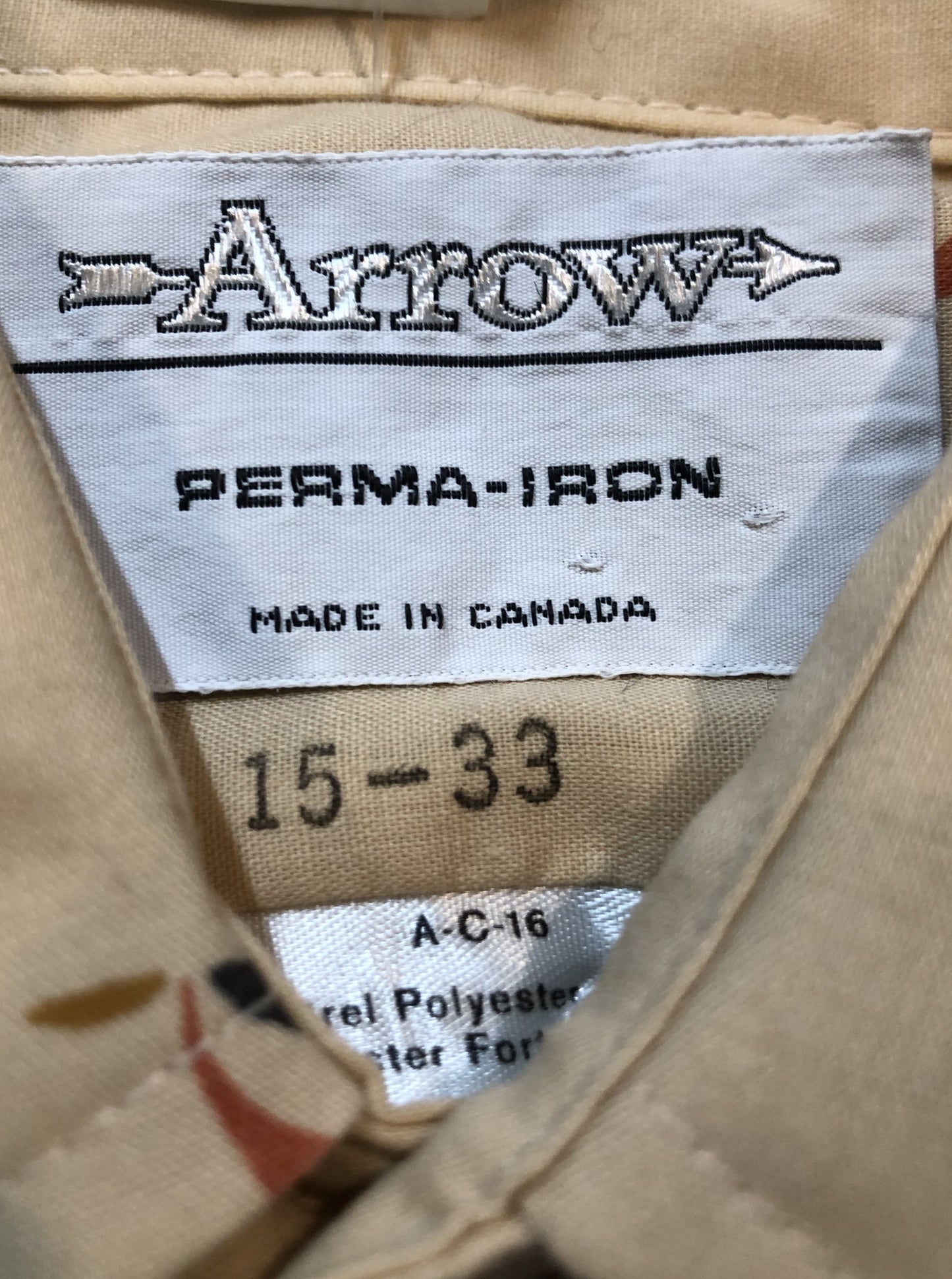 Kingspier Vintage - Vintage Arrow button up shirt in salmon, black, mustard and orange design. Made in Canada. Mens size medium.