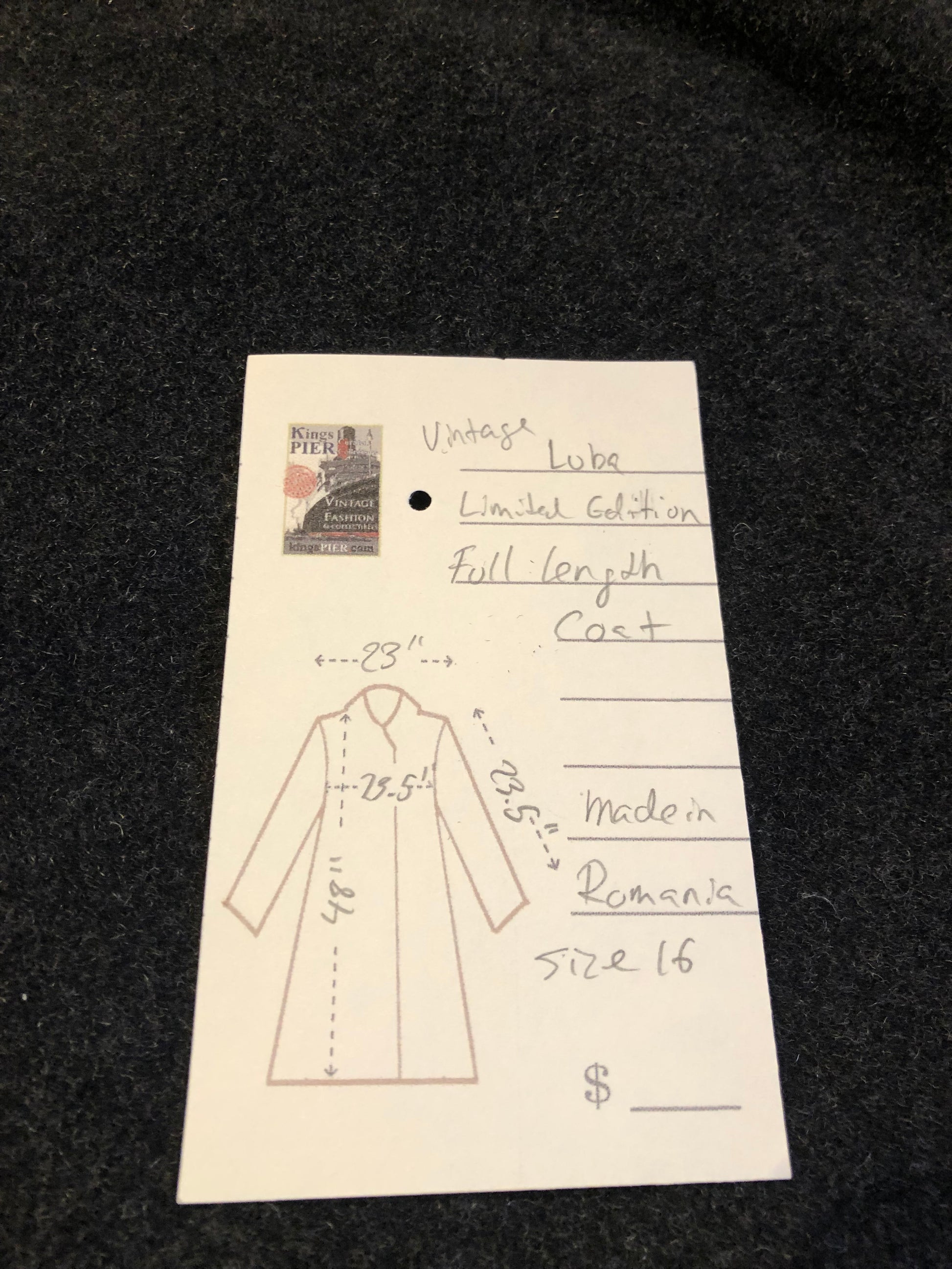 Kingspier Vintage - Vintage Luba limited edition lambswool blend long black coat with woven detail on the front, button closures, two pockets in the front and a satin lining.
Made in Romania.
Size 16.