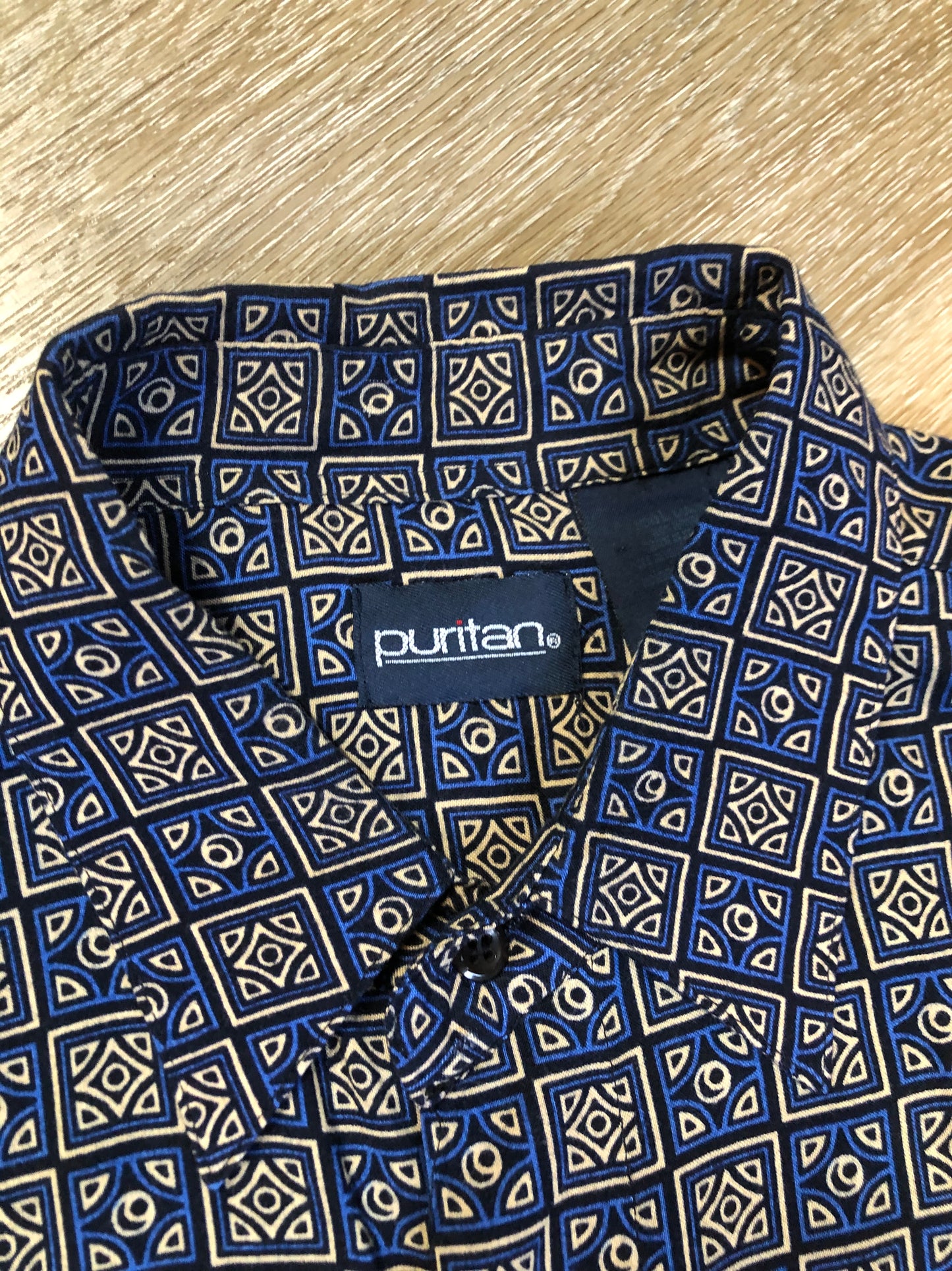 Kingspier Vintage - Puritan short sleeve button up shirt with blue, beige and black design. Size large mens.