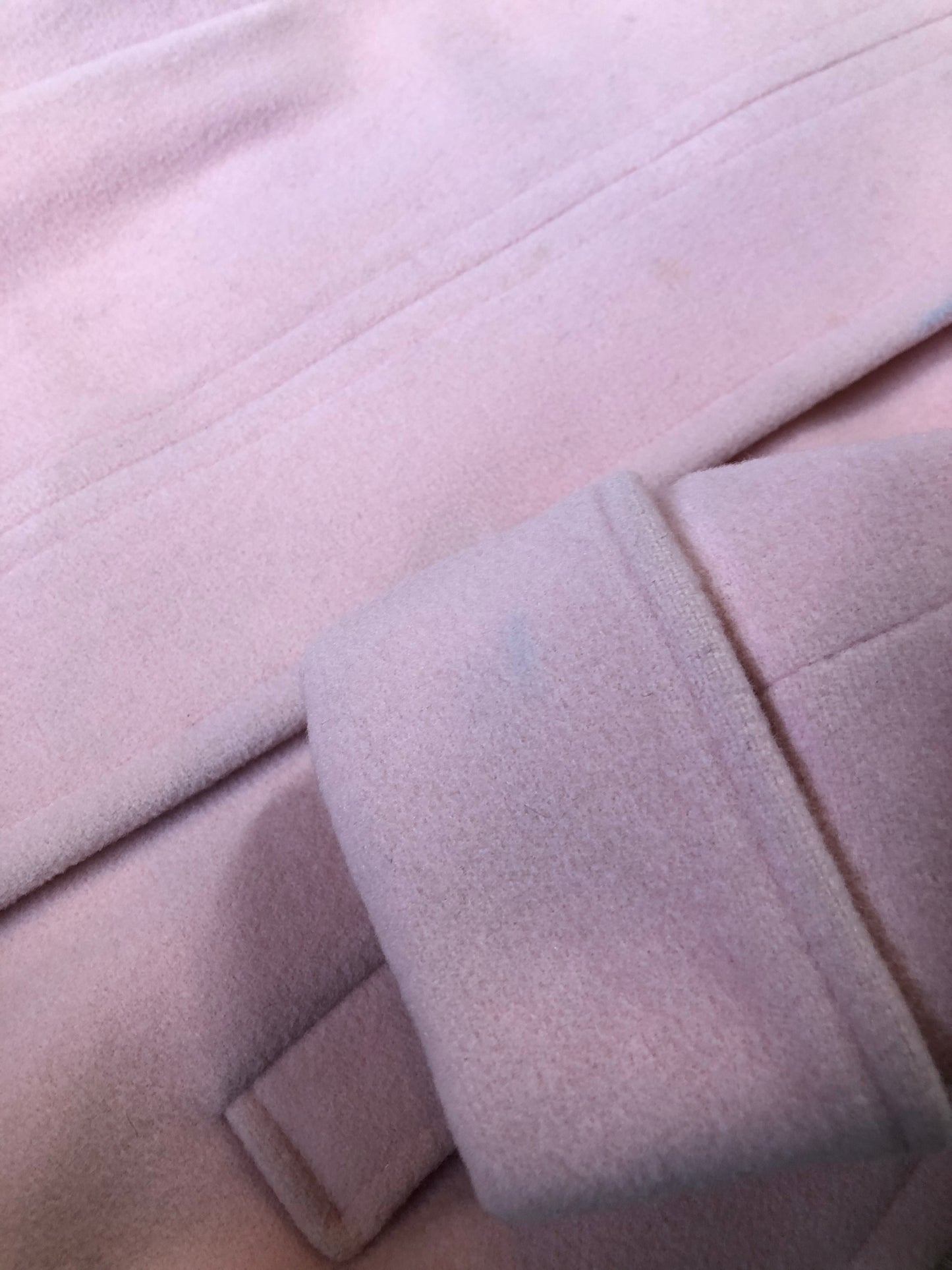 Kingspier Vintage - Novelti pink 100% wool double breasted coat with pleating detail in shoulders, cuffed sleeves, button and snap closures and vertical pockets. Made in Canada. Size small.