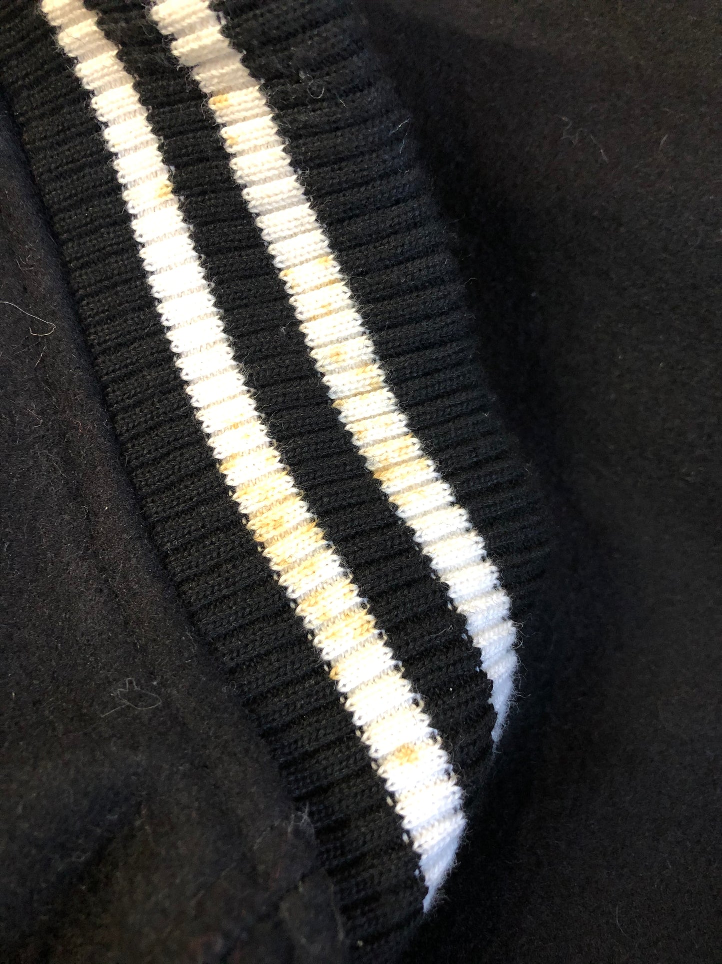 Kingspier Vintage - Coors Light black wool blend varsity jacket with black leather arms, knit trim, slash pockets, snap closure and a quilted lining. Men’s XL.