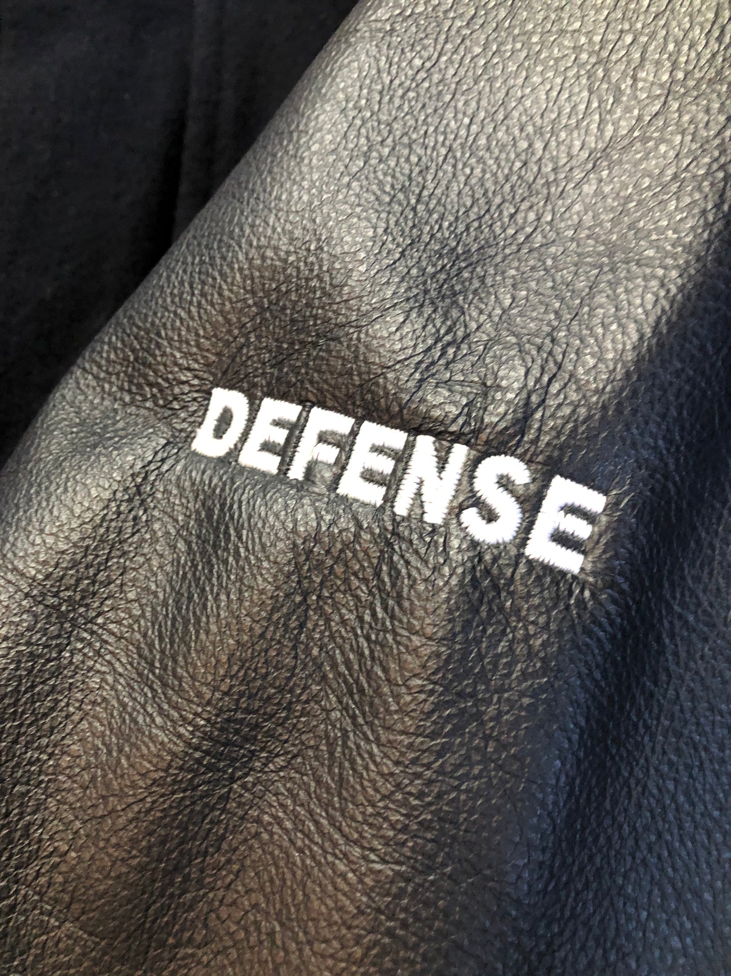 Kingspier Vintage - Dartmouth Whalers navy blue wool blend with leather trim varsity jacket. Jacket features Dartmouth whalers emblem on the chest and the back, “defence” embroidered on the left sleeve and “Forbes” embroidered on the right sleeve, insulated lining, two inside pockets, two slash pockets, zipper and snap closures. Made by Canada sportswear. Size small.