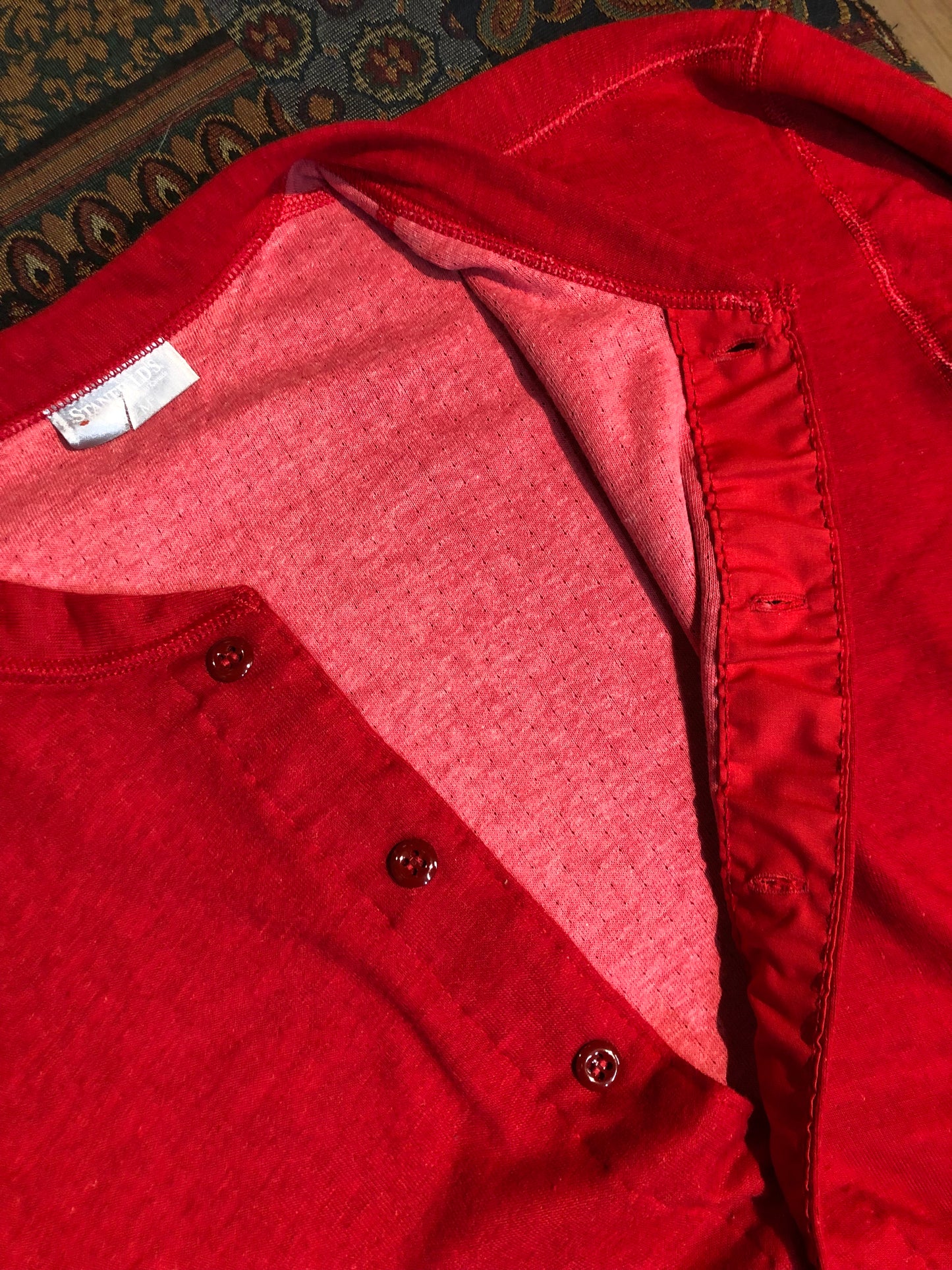 Kingspier Vintage - Stanfield''s deadstock duofold / layered jersey knit union suits in red or grey. The Stanfield's union suits are ingeniously designed with wicking and insulating layers of wool and cotton blends and have been a "staple" of Stanfield’s for many decades. Inner Layer: 50% Cotton/ 50% Polyester Outer Layer: 50% merino wool/ 50% Polyester These onsies are irregular/seconds...we're calling them “I’mperfects” as imperfections are undetectable.