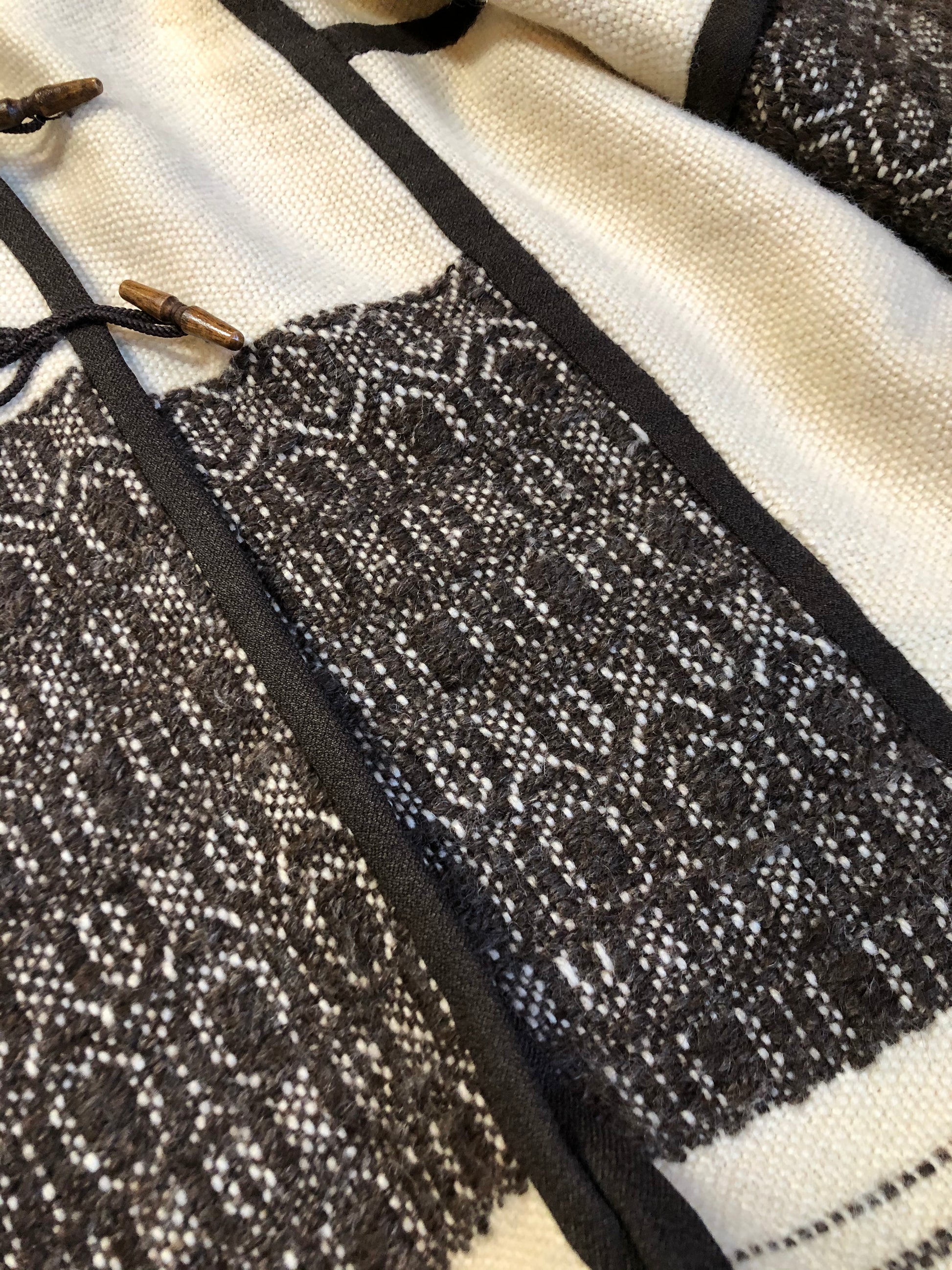 Kingspier Vintage - Vintage handwoven and handmade beige 100^ natural wool cardigan with hood, wooden toggles and inner lining. Made in Nova Scotia. Size medium.