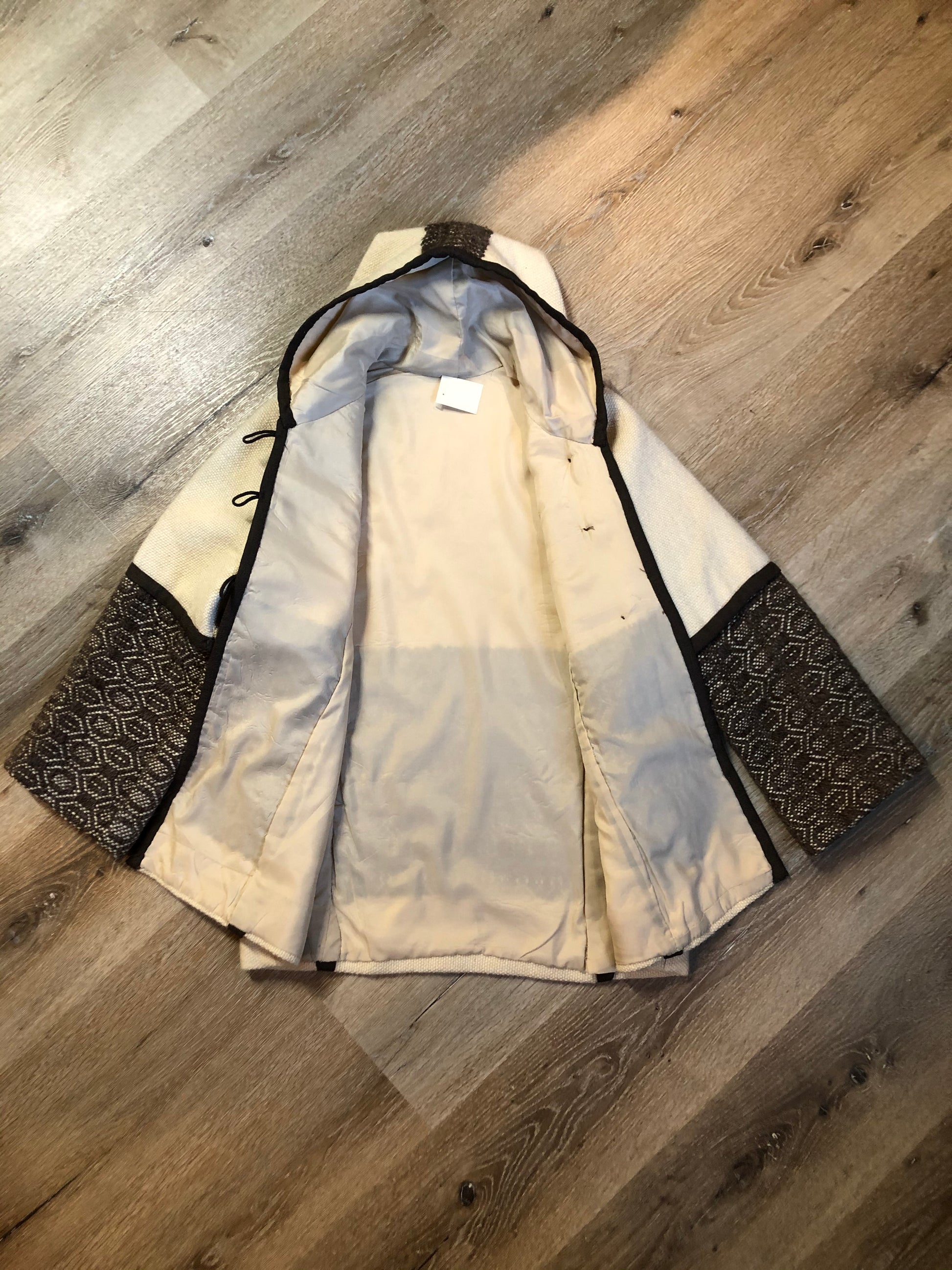 Kingspier Vintage - Vintage handwoven and handmade beige 100^ natural wool cardigan with hood, wooden toggles and inner lining. Made in Nova Scotia. Size medium.