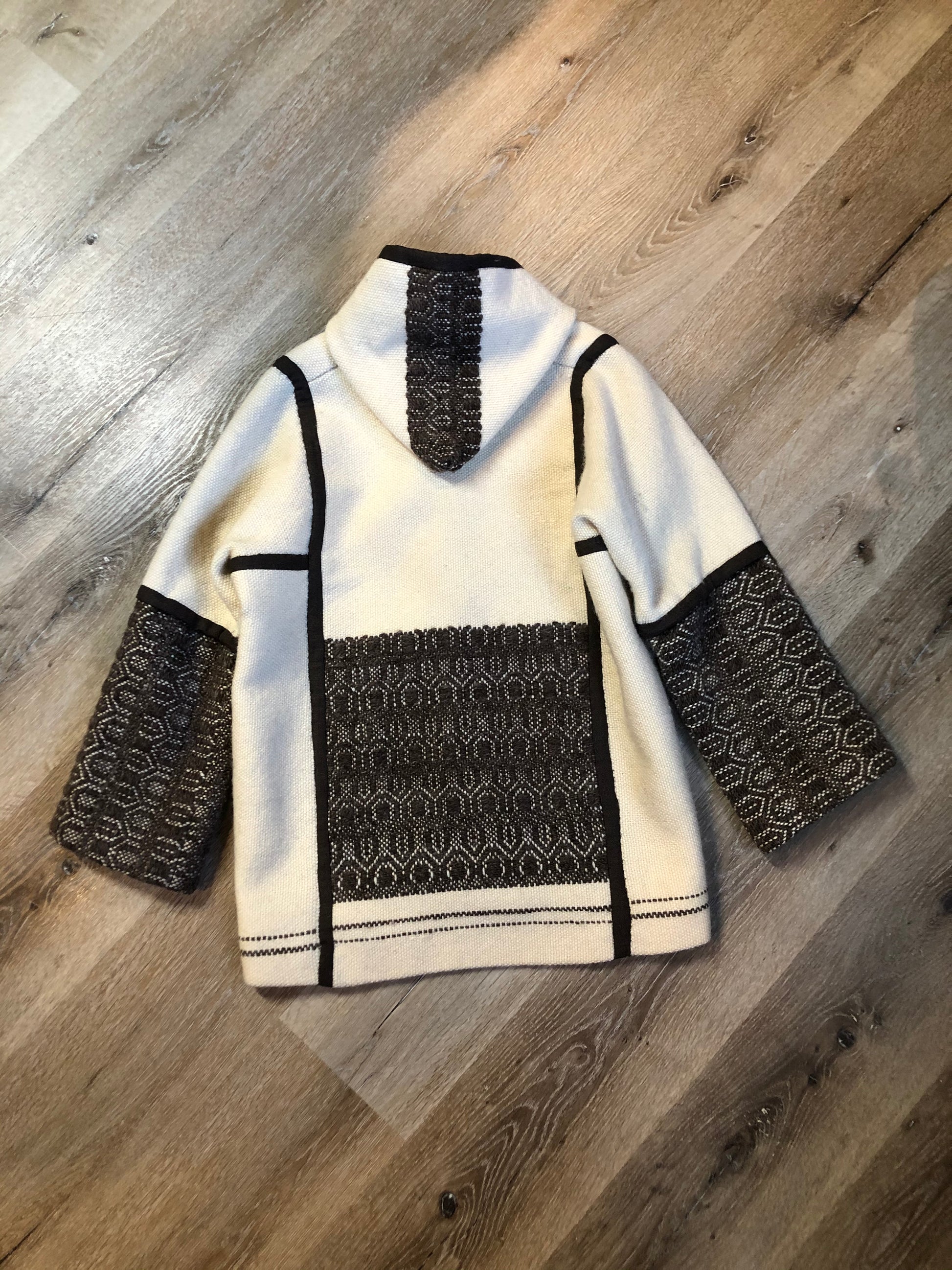 Kingspier Vintage - Vintage handwoven and handmade beige 100^ natural wool cardigan with hood, wooden toggles and inner lining. Made in Nova Scotia. Size medium.