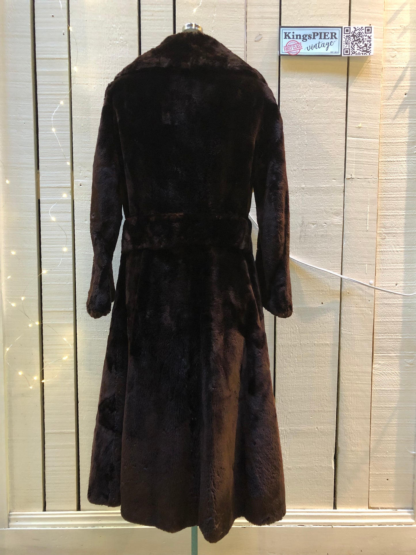 Kingspier Vintage - Vintage House of Appel long fur coat with flared sleeves, hook and eye closures, two front pockets and a “L.C.J.” monogram in the satin lining.