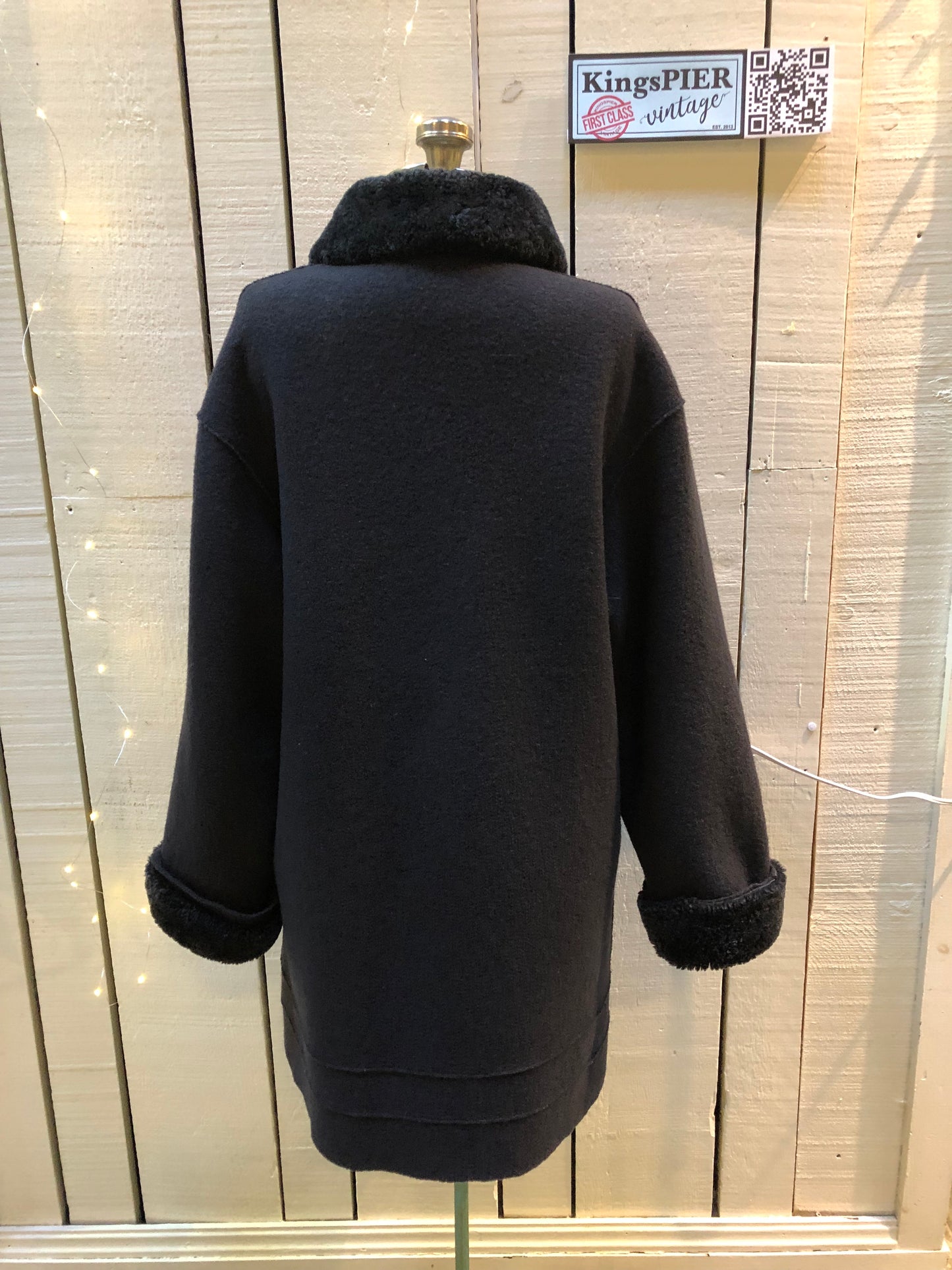 Kingspier Vintage - Vintage Hilary Radley 100% wool coat with shearling trim collar and cuffs, button closures and patch pockets.Made in Canada.Size 6.