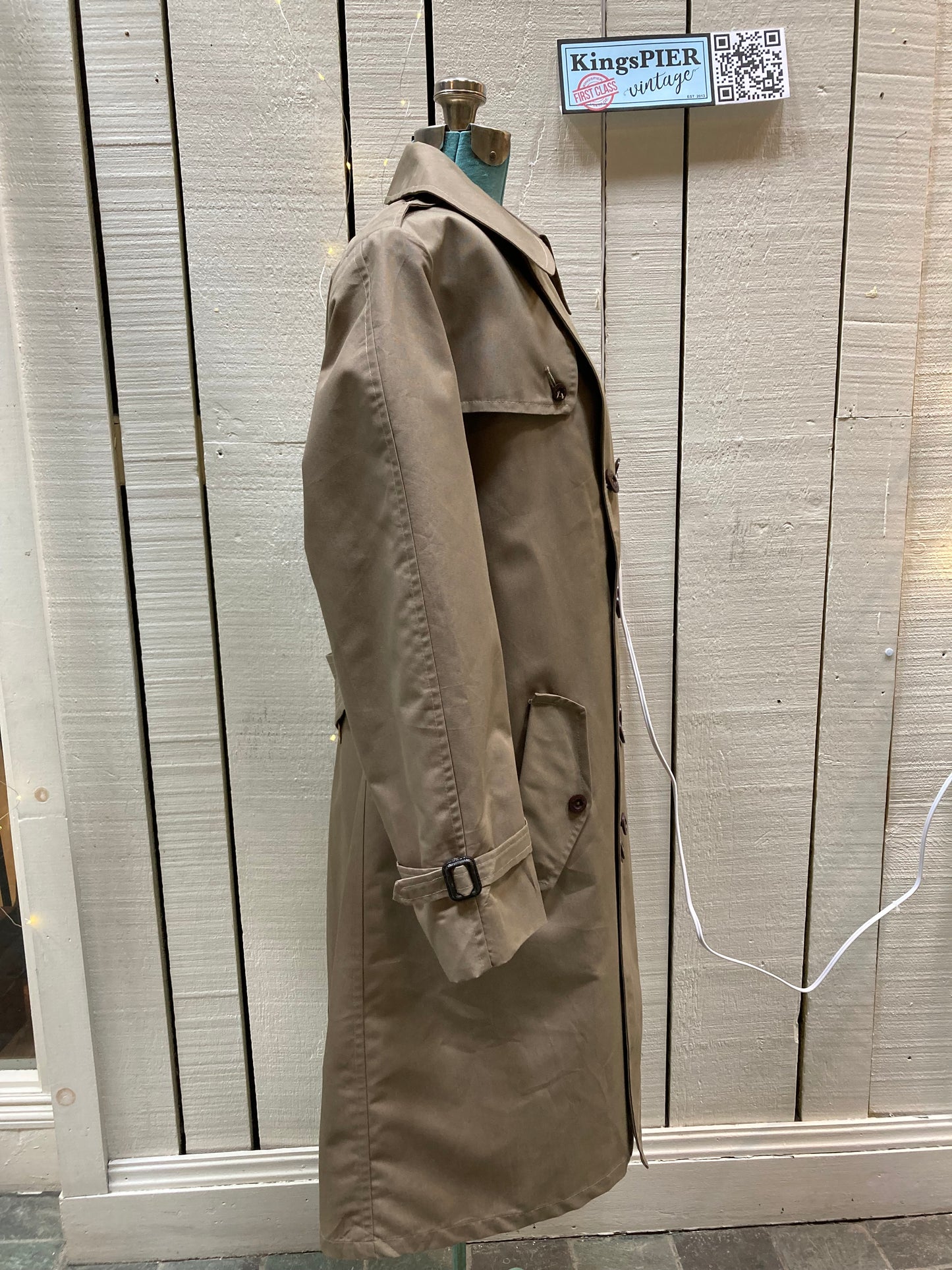 Kingspier Vintage - Vintage Sterlingwear of Boston double breasted trench coat with belt and flap pockets.