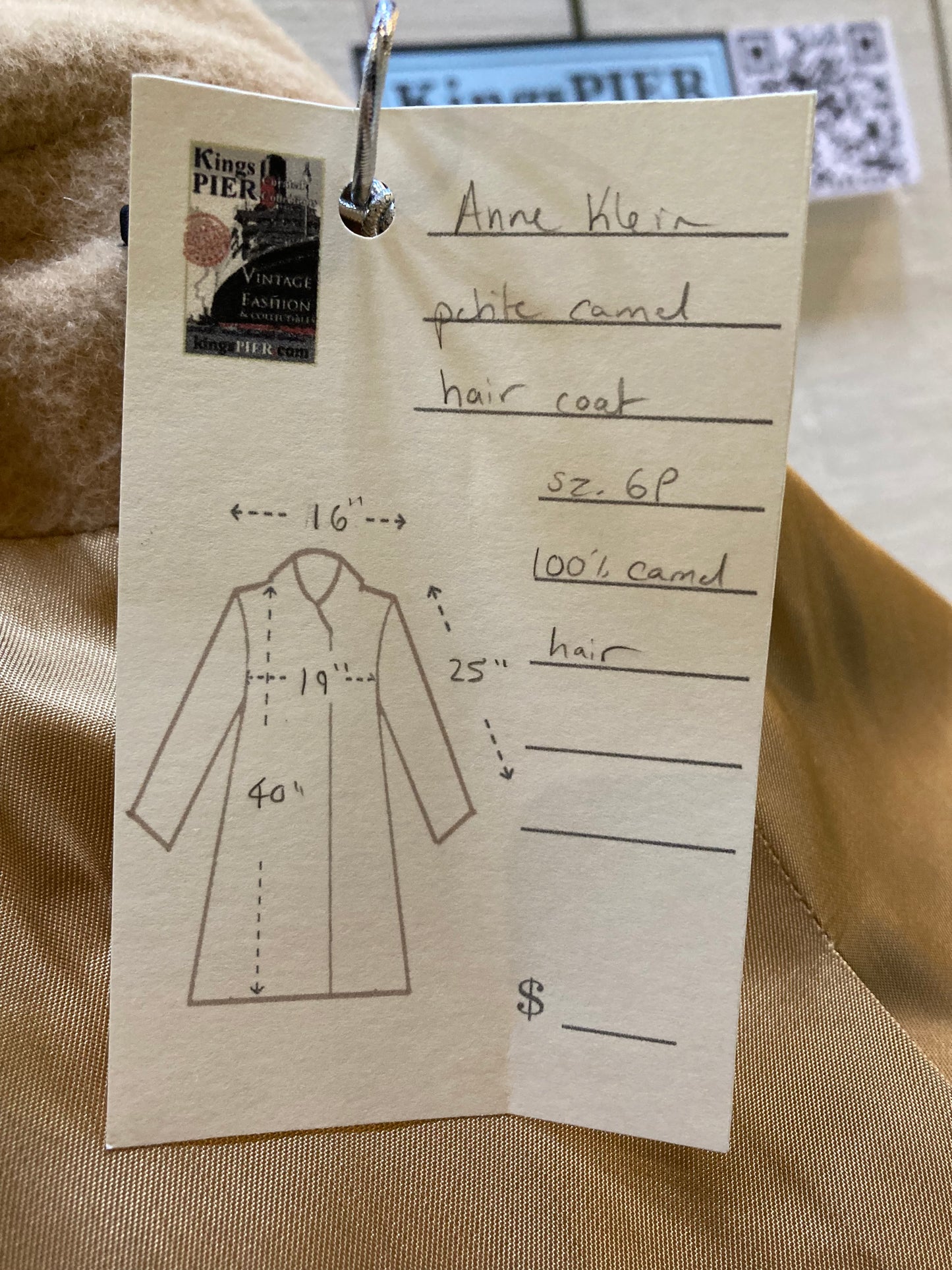 Kingspier Vintage - Anne Klein beige camel hair coat is double breasted with two front pockets,
Size 6P