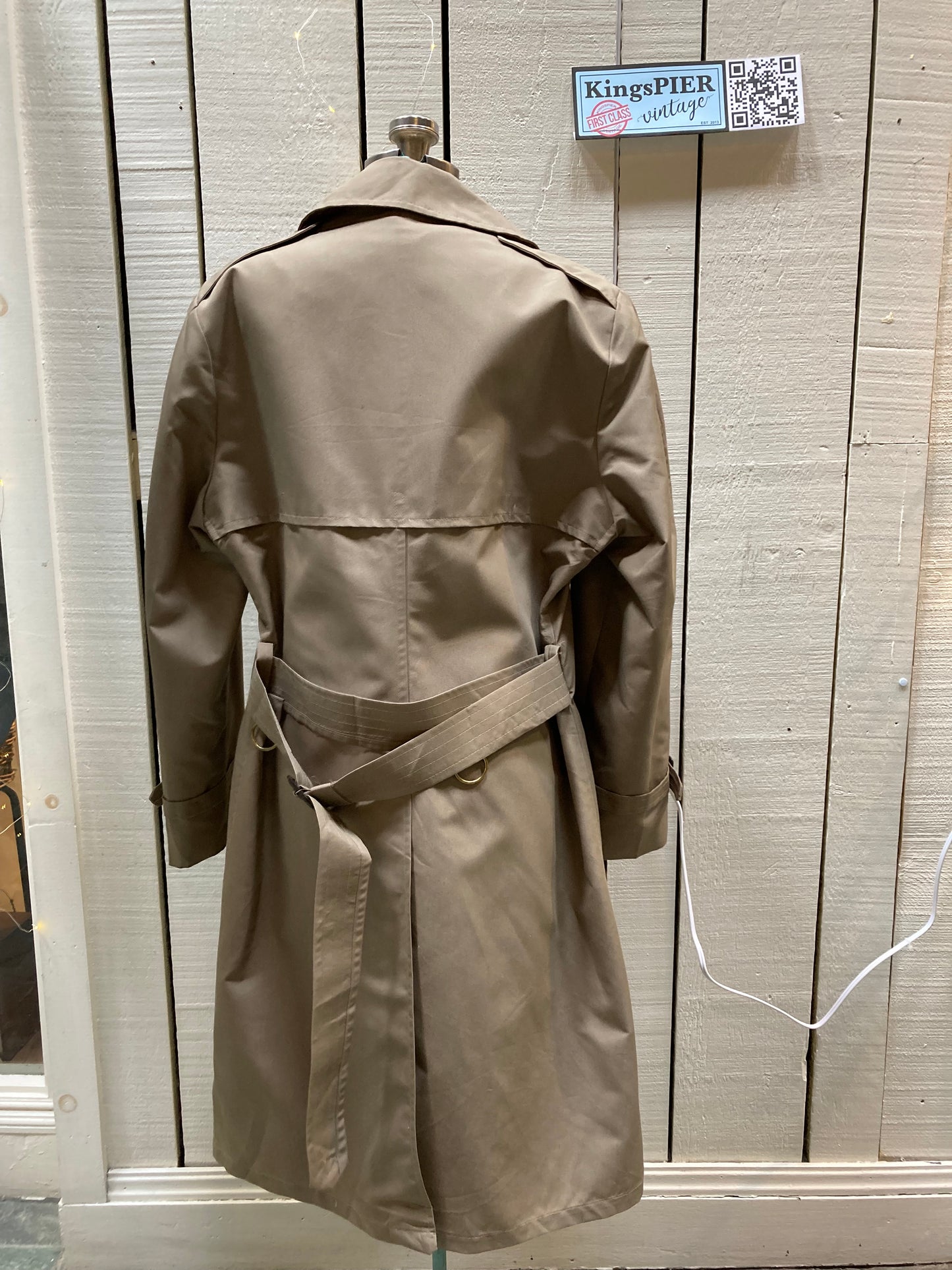 Kingspier Vintage - Vintage Sterlingwear of Boston double breasted trench coat with belt and flap pockets.