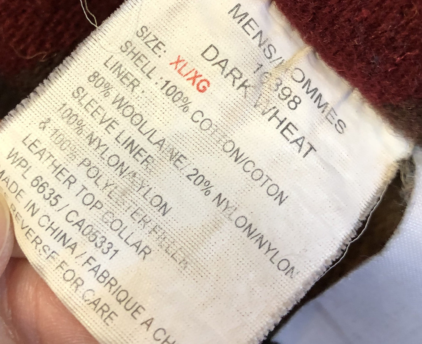 Kingspier Vintage - Woolrich beige chore jacket with cotton shell, leather collar, wool blend lining, snap closures and two flap pockets. Size XL.