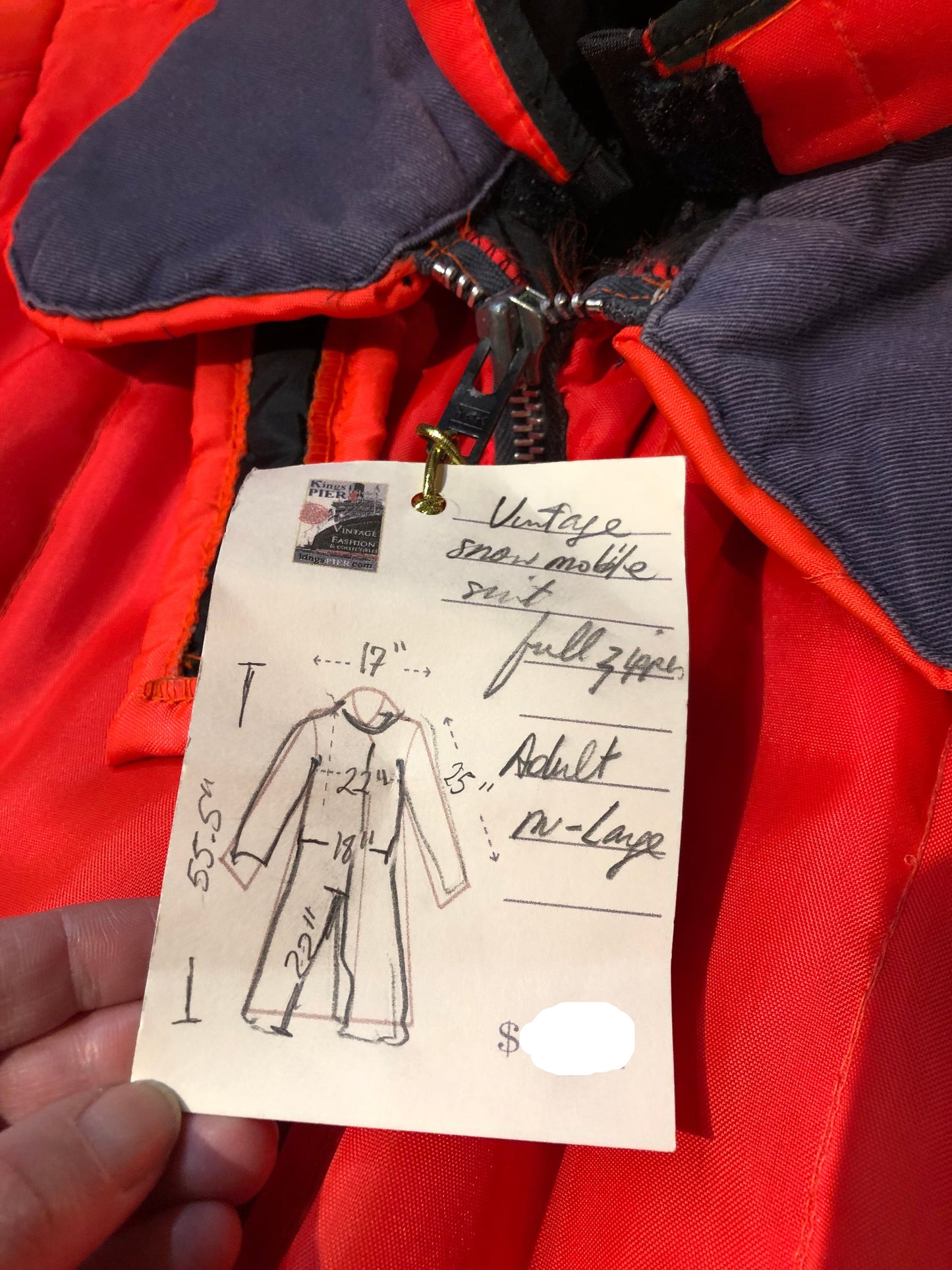 Kingspier Vintage - Vintage blaze orange one piece snowmobile suit, with hood, quilted lining and full length zipper.
Size large.