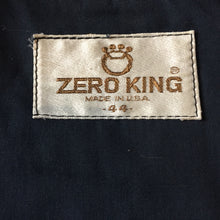 Load image into Gallery viewer, Kingspier Vintage - 1960s Vintage Zero King storm jacket in beige with hood, zipper closure, four flap pockets on the front, drawstring at the waist. Made in USA. Size 44.

