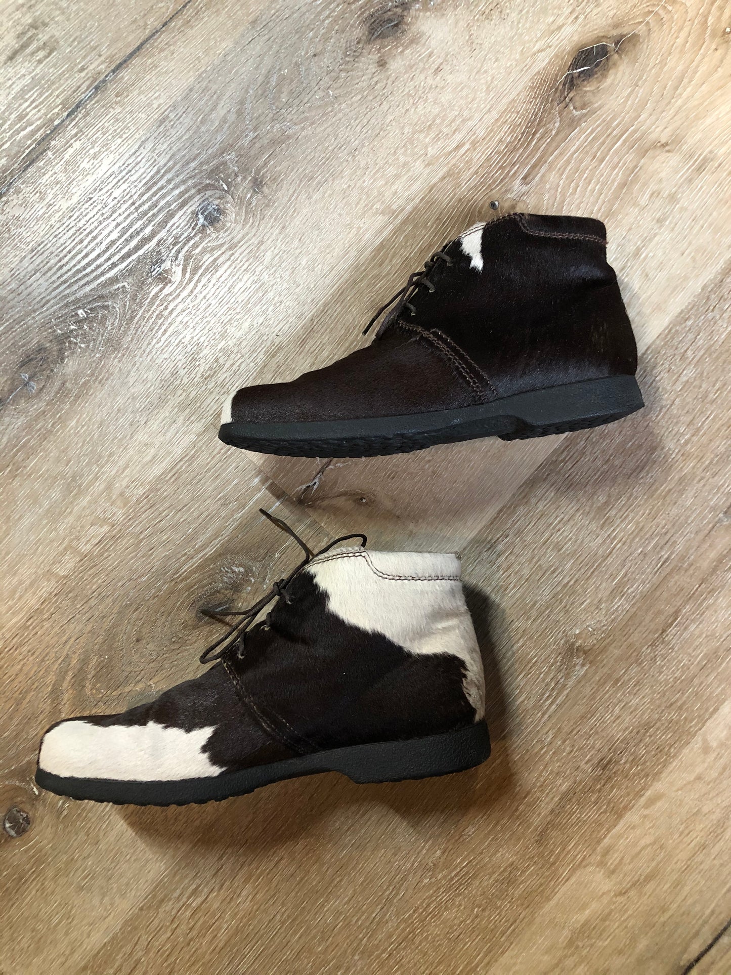 Vintage JP Tod’s brown and white cowhide, three eyelet, leather lined boots. Made in Italy. Size 7.5 US Womens