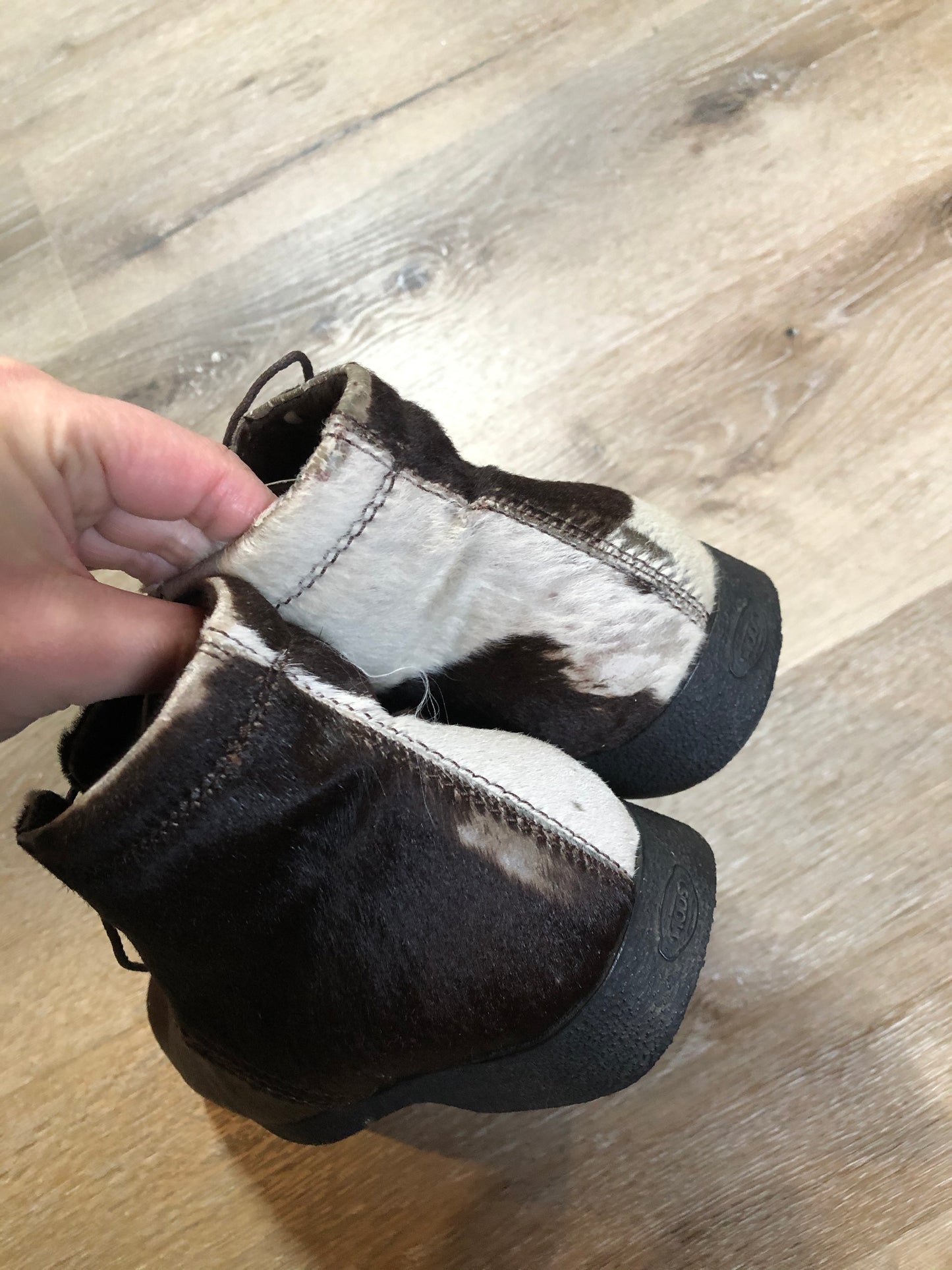 Vintage JP Tod’s brown and white cowhide, three eyelet, leather lined boots. Made in Italy. Size 7.5 US Womens