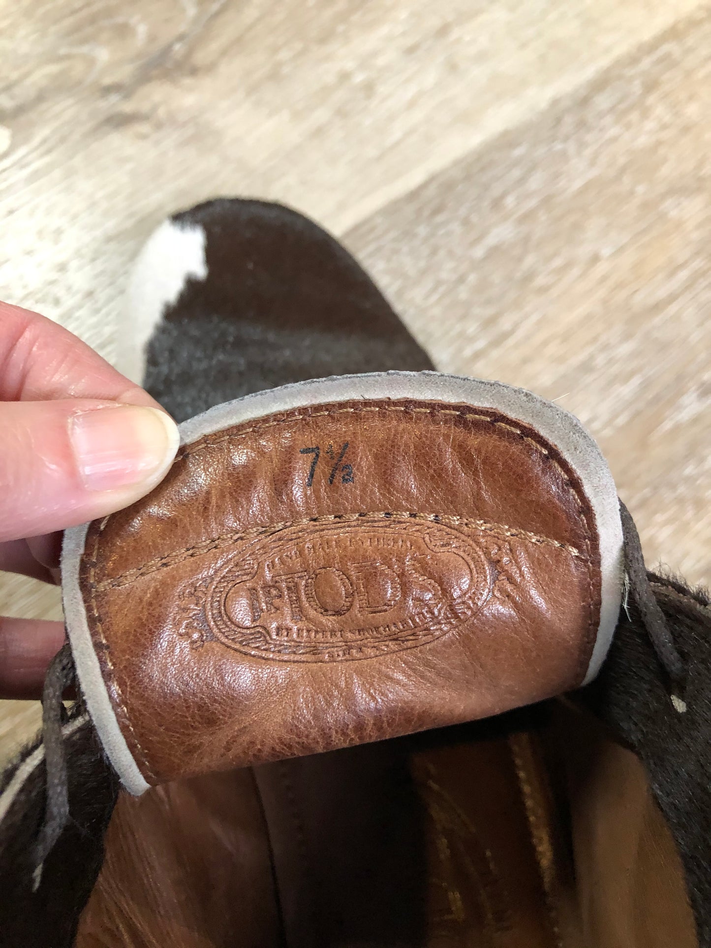 Vintage JP Tod’s brown and white cowhide, three eyelet, leather lined boots. Made in Italy. Size 7.5 US Womens