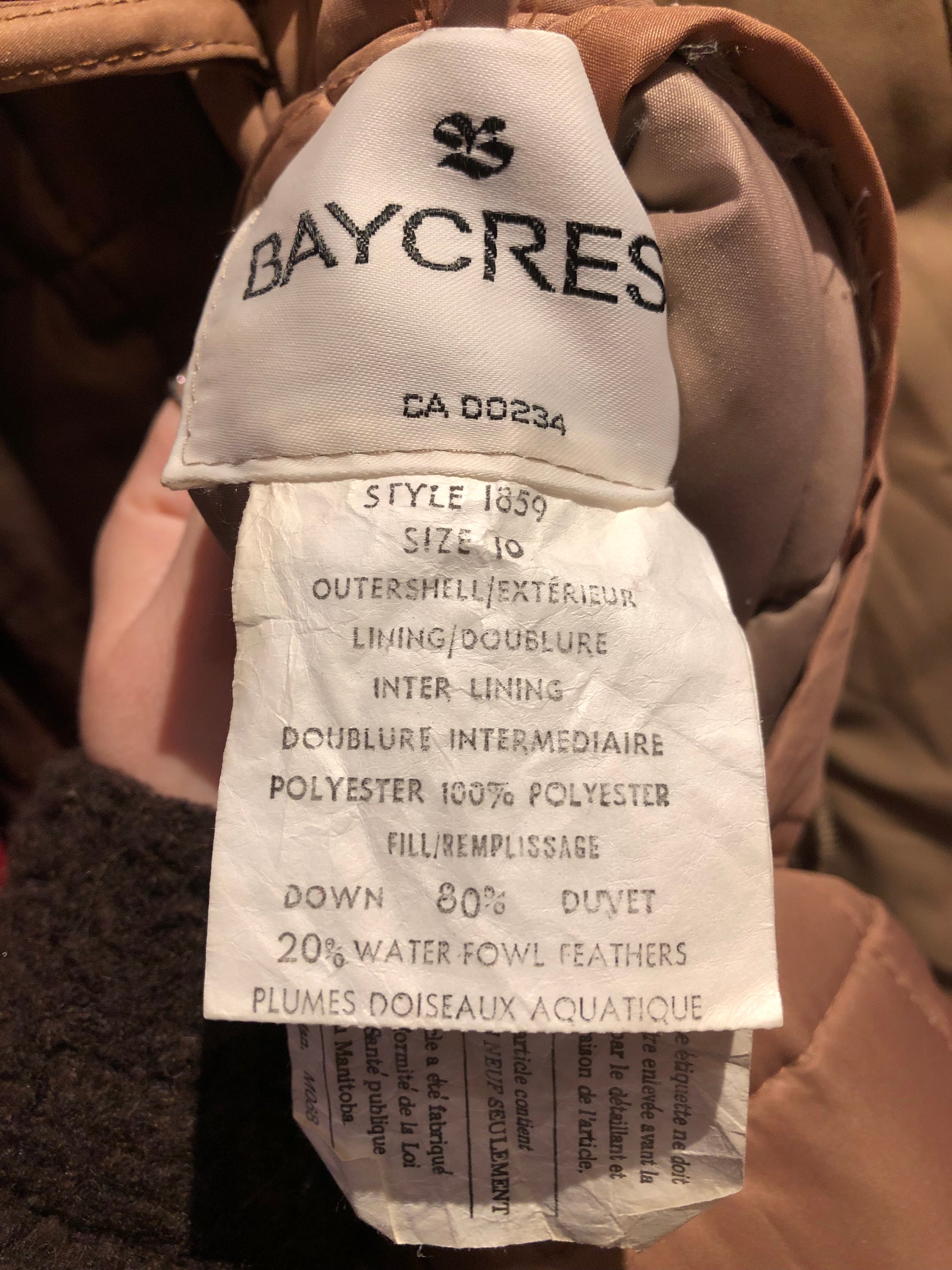 Kingspier Vintage - Vintage 80’s Baycrest pink down-filled coat with raccoon fur trimmed hood, snap closures, two pockets in the front and two inside flap pockets. 80% down/ 20% feather.
Size 10, (Medium)
Union made in Canada.