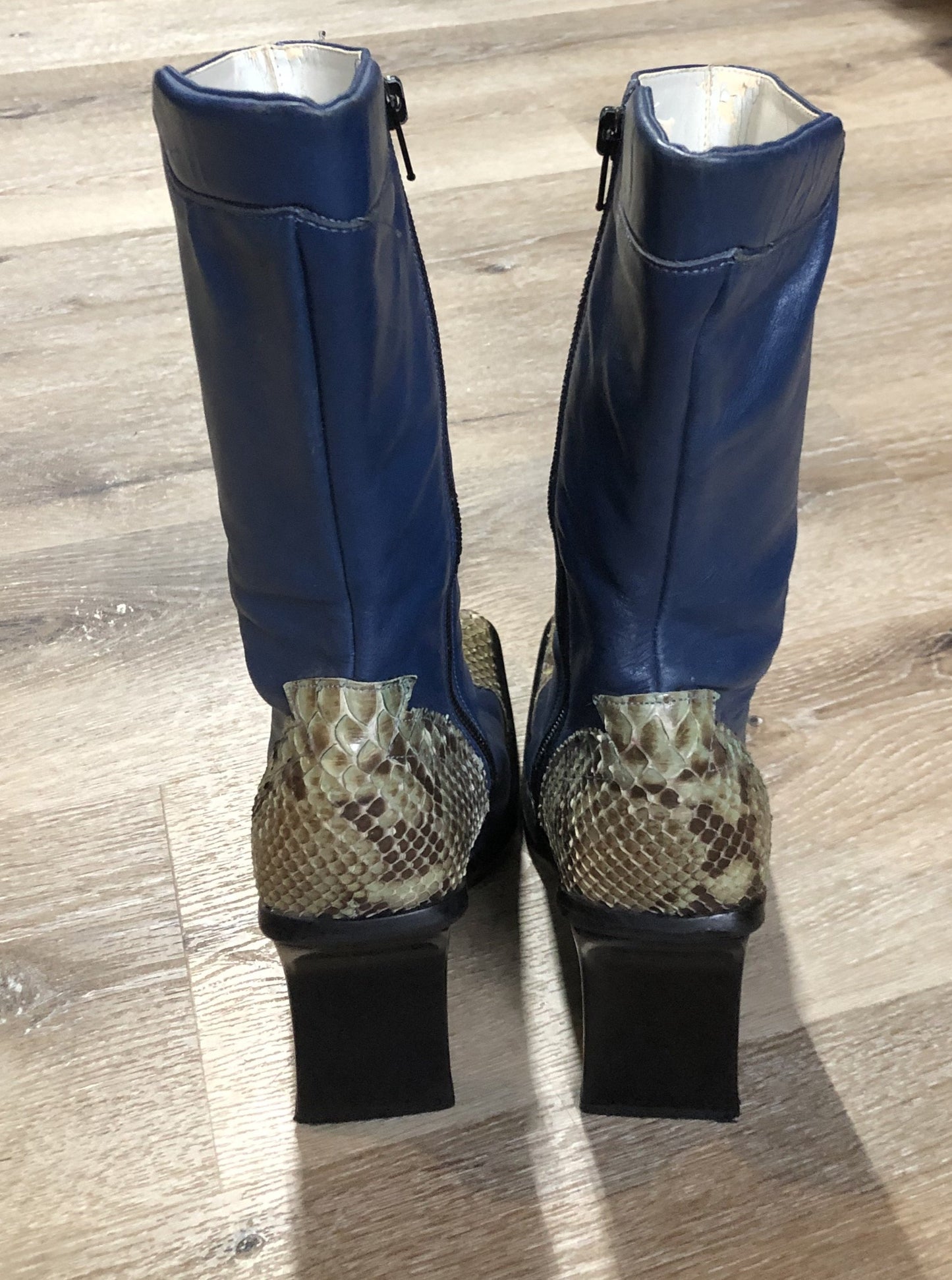 Vintage 90’s Pegabo Attitude blue leather high heel Boot with genuine snakeskin accents, rectangle heel and square toe. Made in Italy.
Size 38 EUR Womens