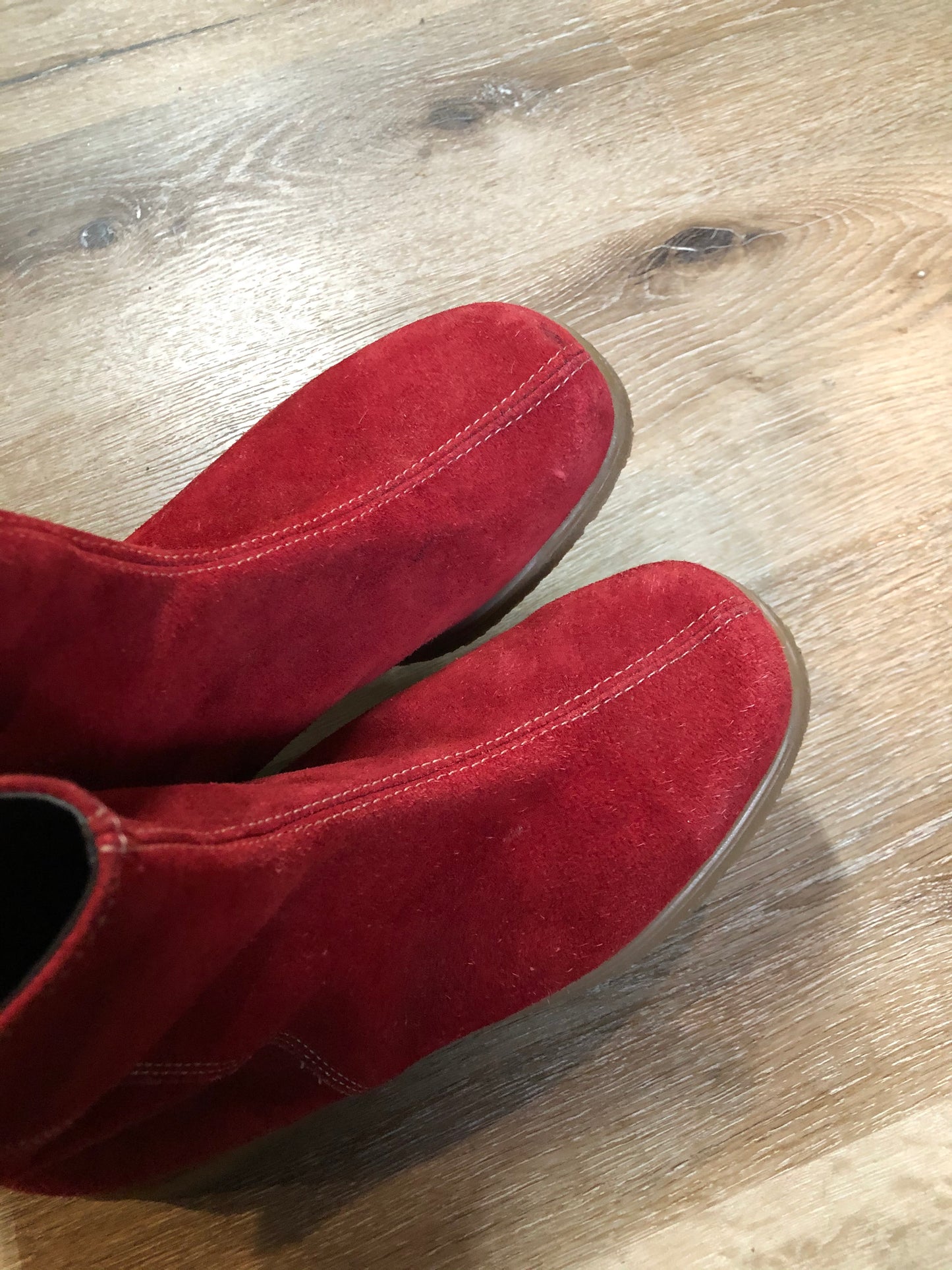 Vintage red suede ankle boots with crepe sole, Made in Canada.
Size fits like a 7 US Womens