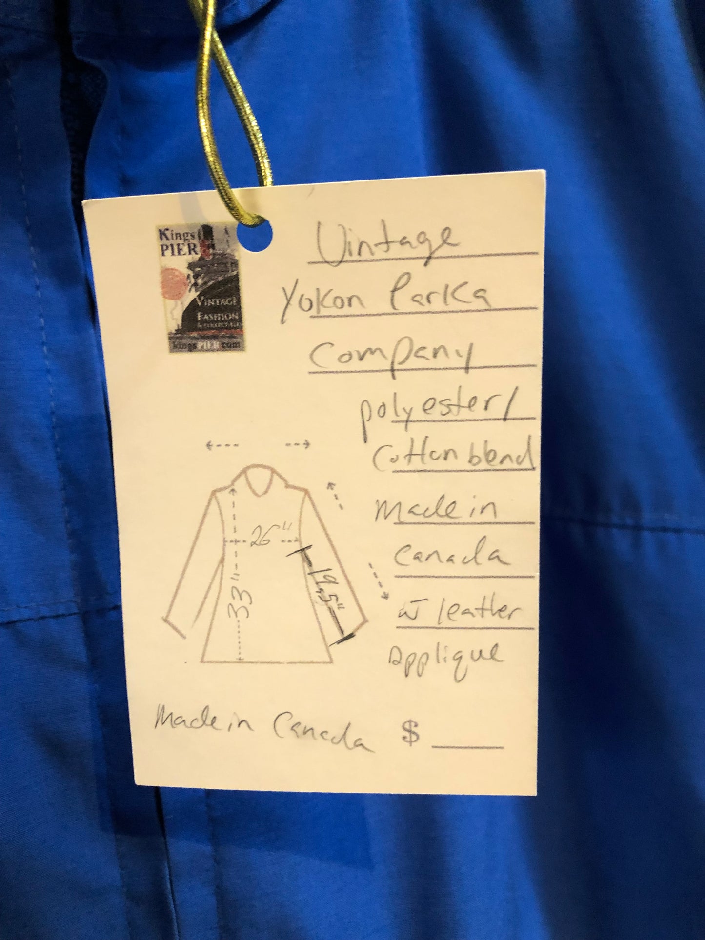 Kingspier Vintage - Vintage Yukon Parka Company blue lightweight parka, polyester/ cotton blend with hood, zipper closure and leather dolphin applique details.
Size XL.
Made in Canada.