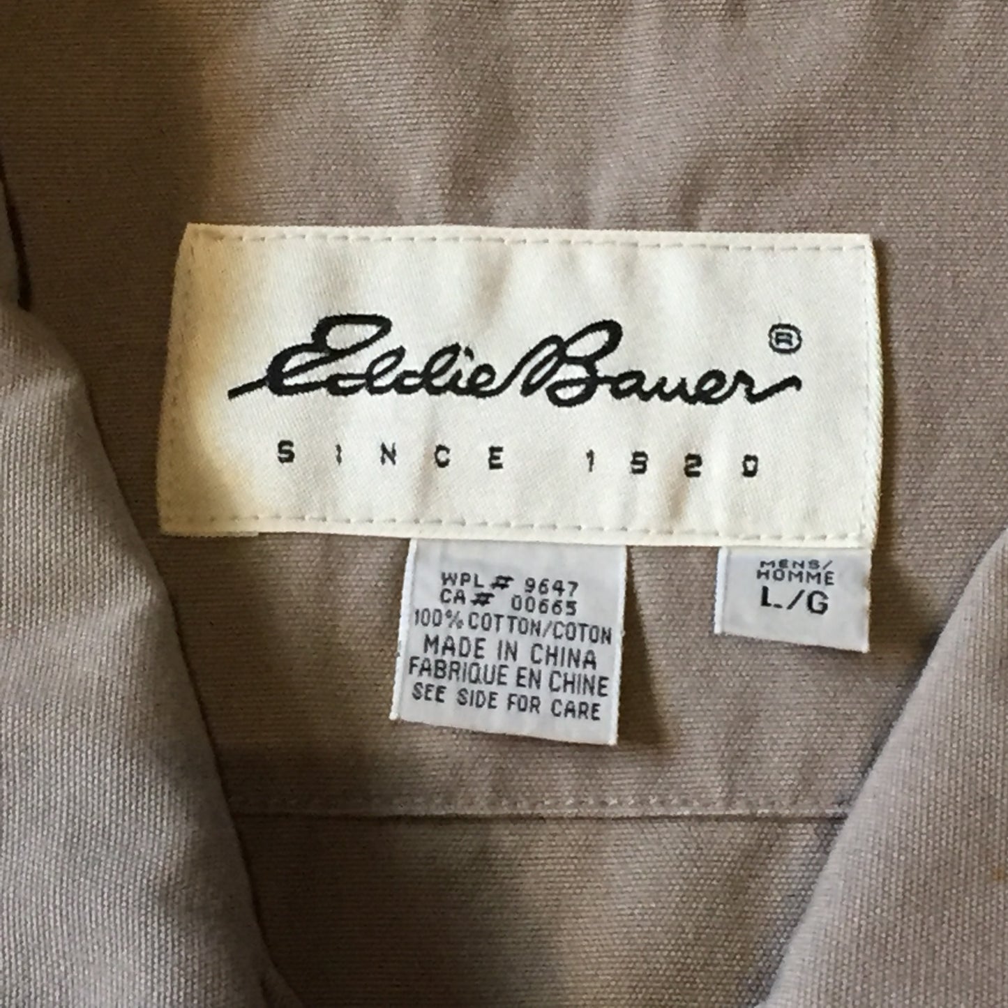 Kingspier Vintage - Eddie Bauer beige 100% cotton chore jacket with zipper closure and two flap pockets. Size large.