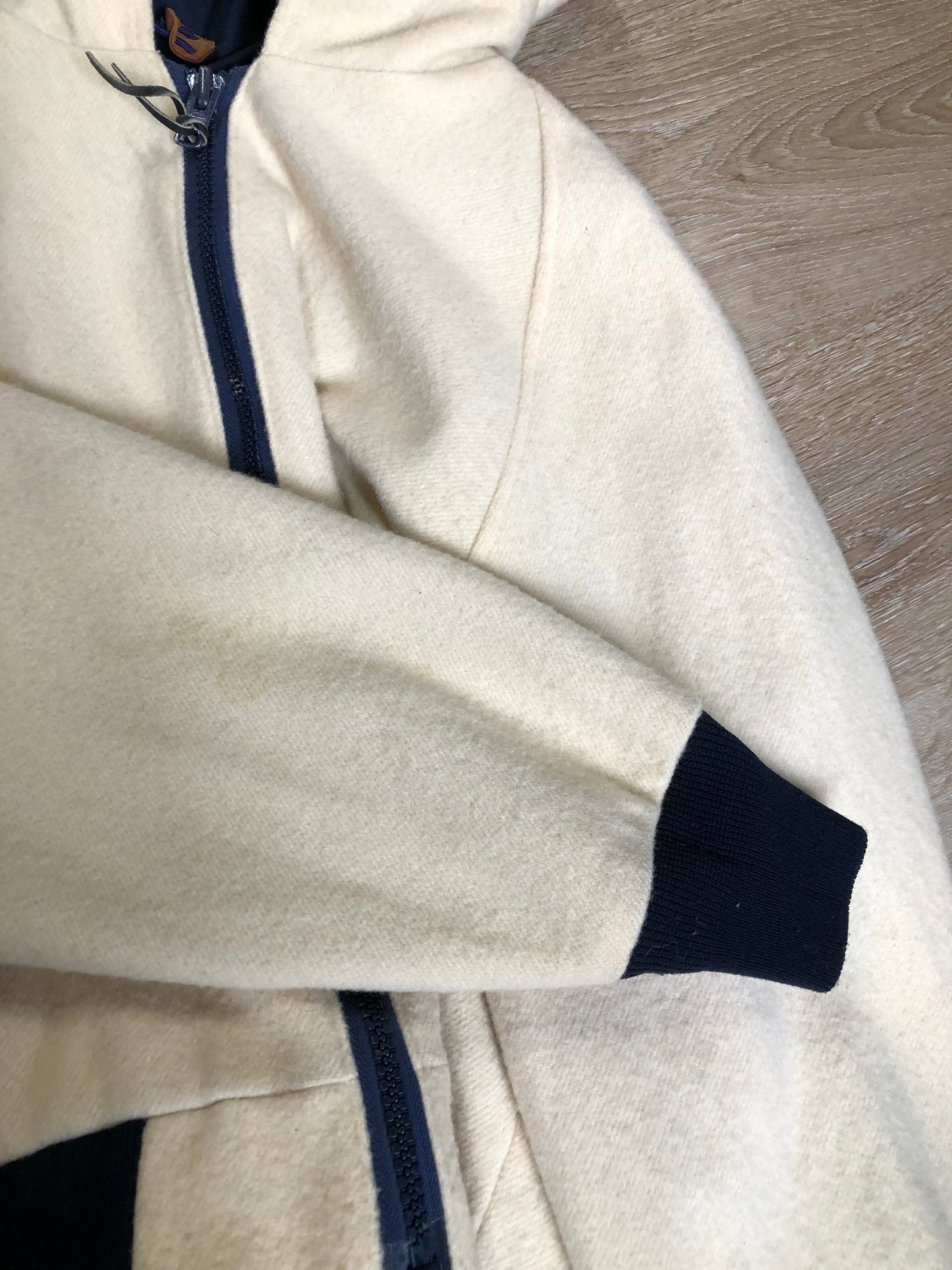 Kingspier Vintage - Woolrich white 100% wool jacket with hood, zipper closure, two zip pockets, knit trim and poly blend liner. Made in USA. Size XL.