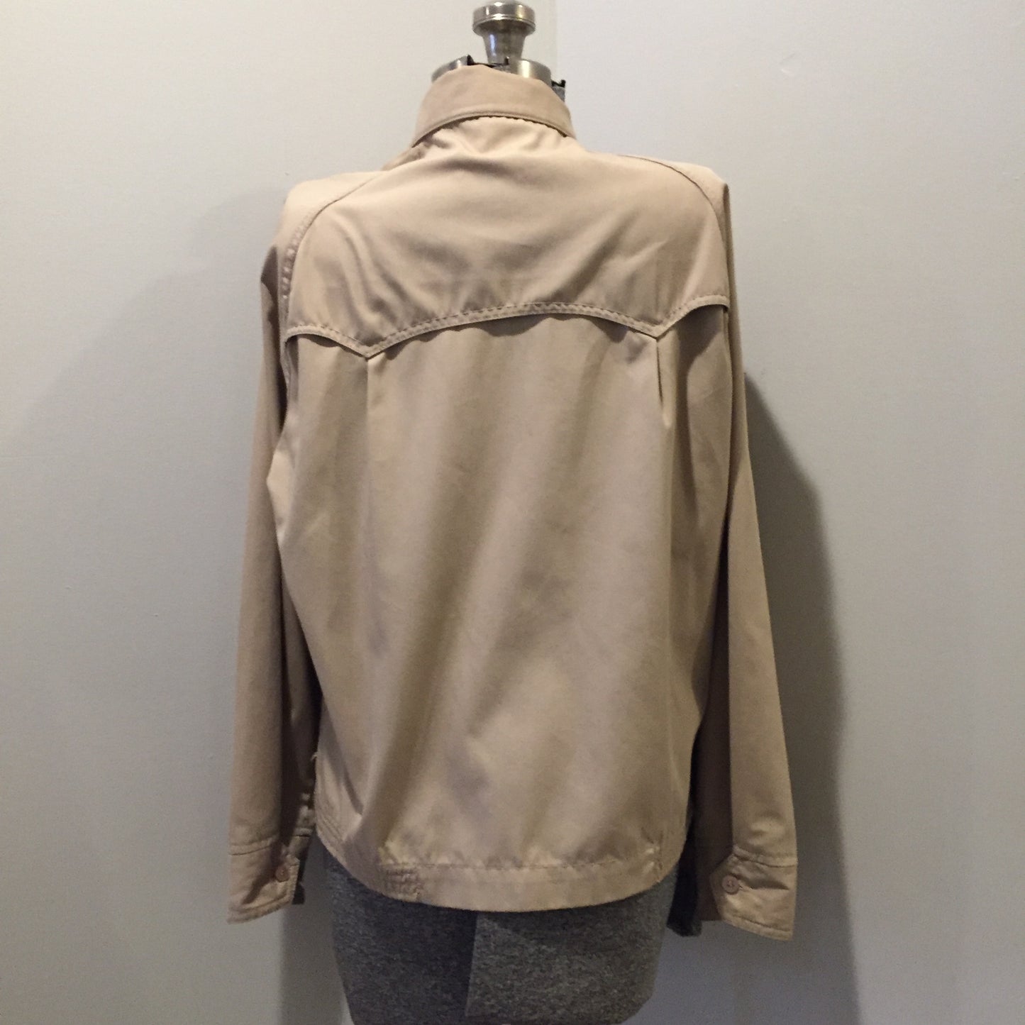 Kingspier Vintage - Vintage Thunderbird beige lightweight cotton/ poly blend jacket with zipper closure, slash pockets and nylon. Made in Korea. Size medium.